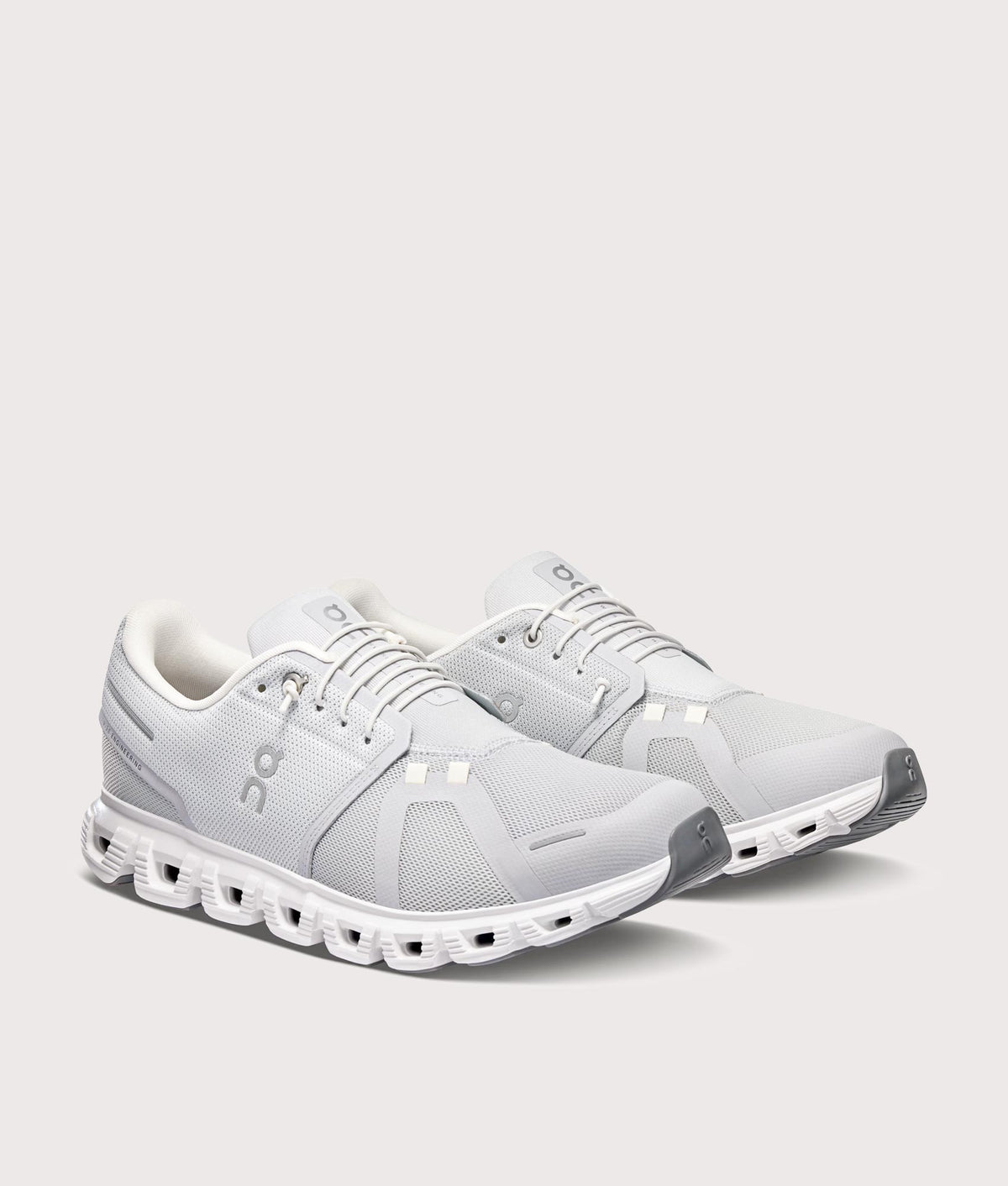 On Cloud 6 Sneakers in Glacier and White at EQVVS Menswear. Angled front shot.
