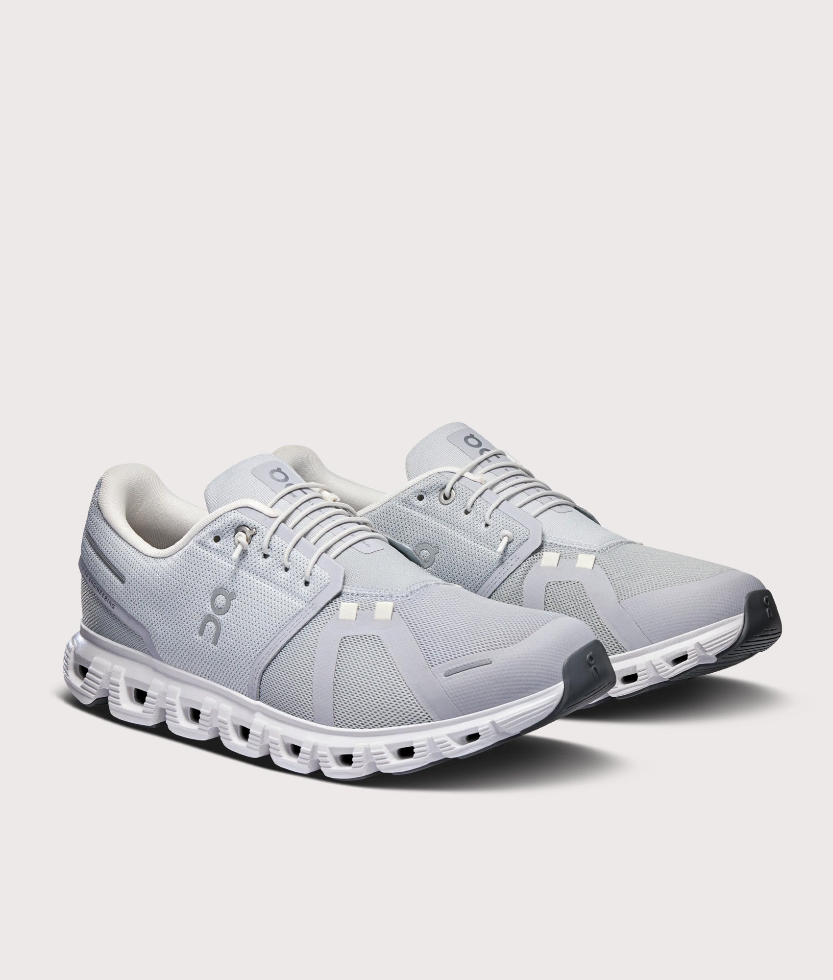 On Cloud 6 Sneakers in Glacier and White at EQVVS Menswear. Angled front shot.