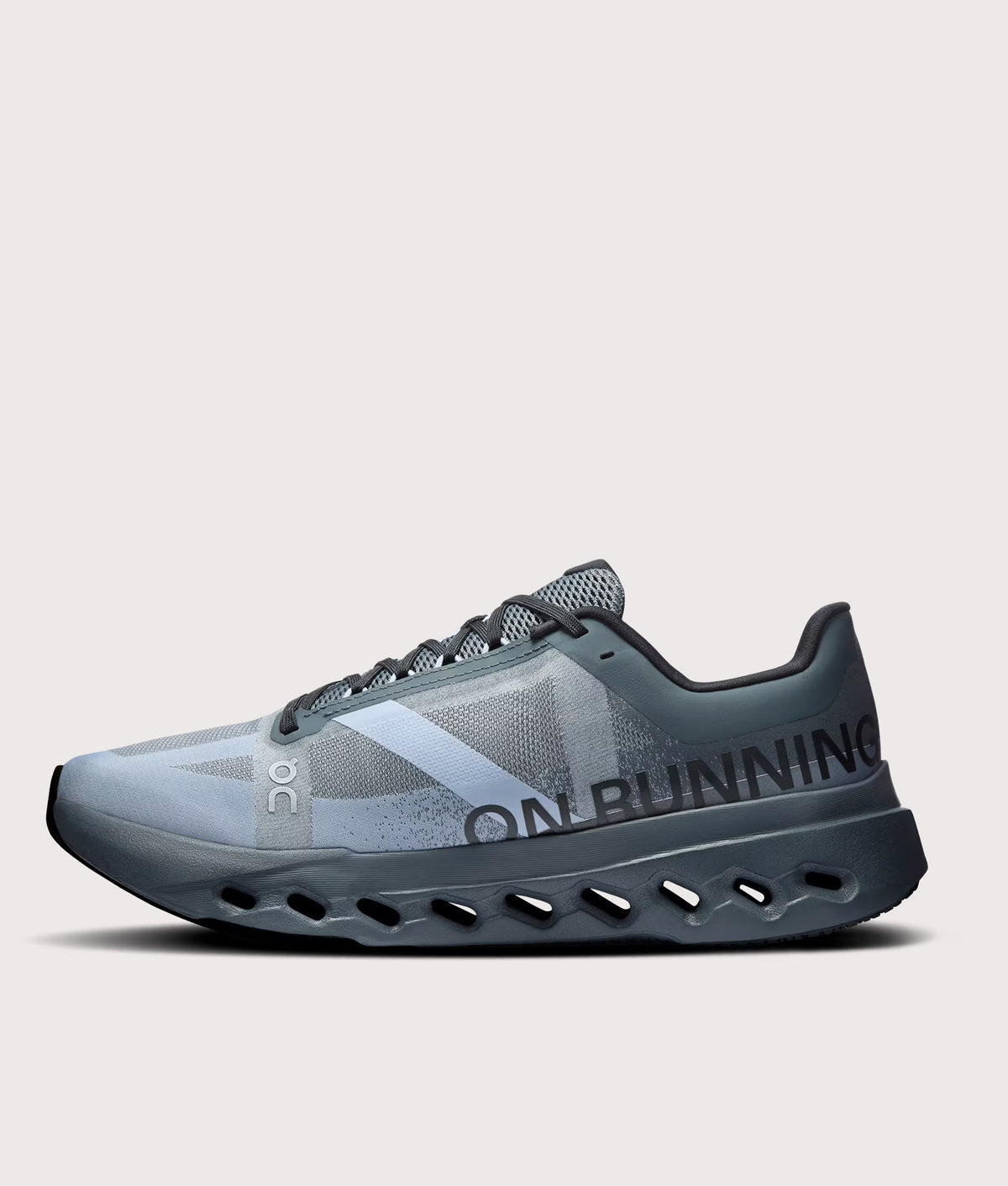 On Cloudsurfer Next Sneakers in Stone/Marsh at EQVVS Menswear. Side shot.