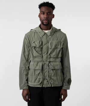CP Company Chrome-R Goggle Utility Jacket in Agave Green, 100% Polyamide Front  Shot at EQVVS