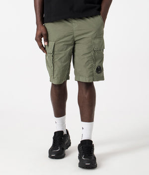 Chrome-R Cargo Bermuda Shorts in Agave Green by C.P. Company. EQVVS Front Angle Shot.