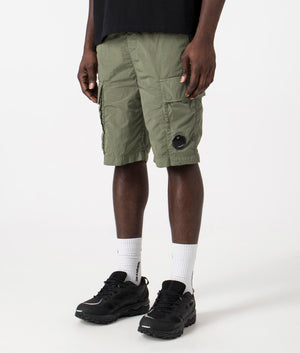 Chrome-R Cargo Bermuda Shorts in Agave Green by C.P. Company. EQVVS Side Angle Shot.