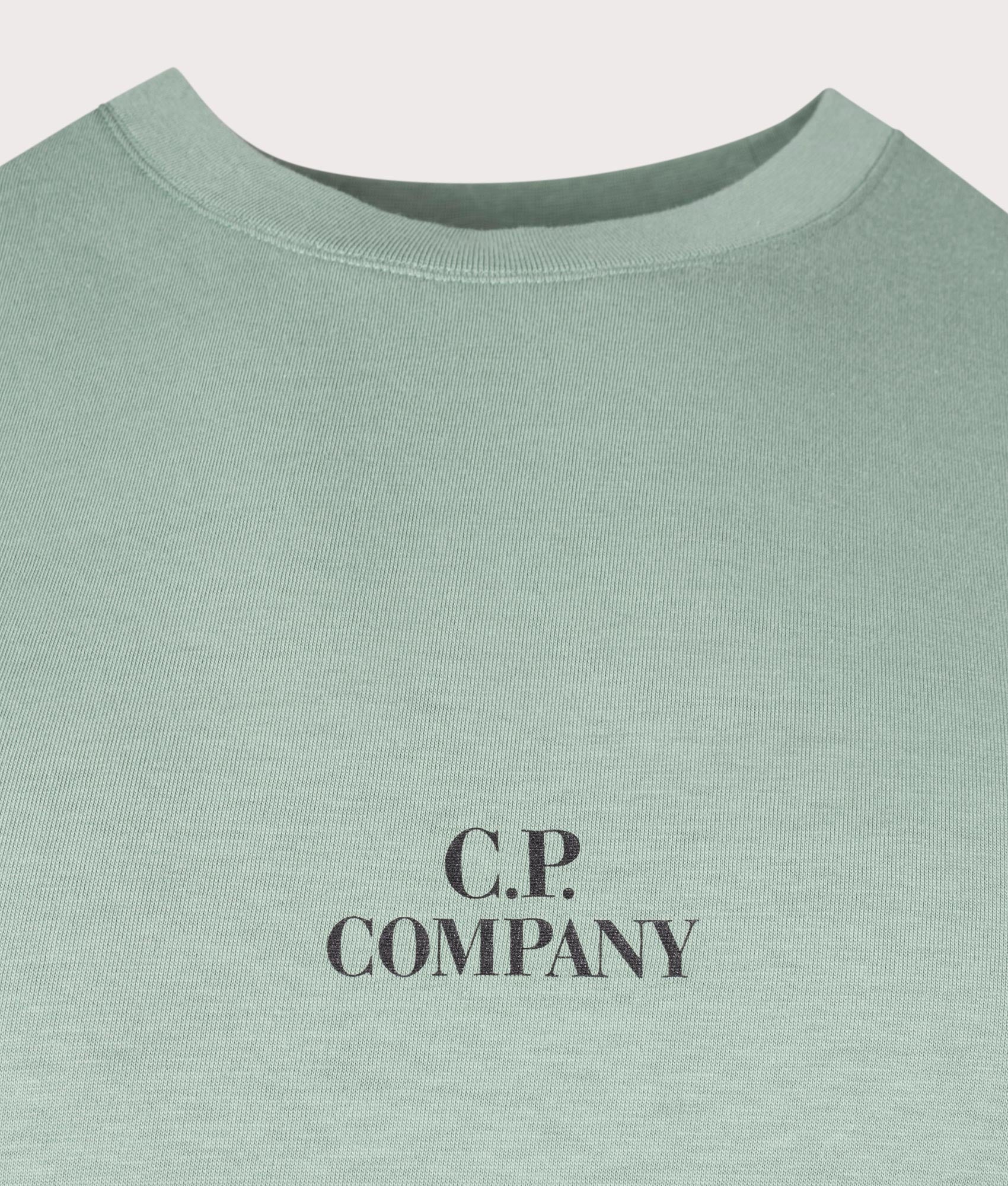 CP Company 30/1 Jersey Graphic T-Shirt in Bay Green with large CP Company Back Print, 100% Cotton Detail Shot at EQVVS