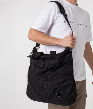 CP Company Nylon Tote Bag in Black featuring the CP Goggle Worn Shot at EQVVS
