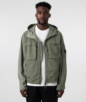 CP Company Chrome-R Hooded Jacket in Agave Green, 100% Polyamide Front Unzipped Shot at EQVVS
