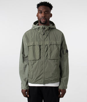 CP Company Chrome-R Hooded Jacket in Agave Green, 100% Polyamide Front Shot at EQVVS