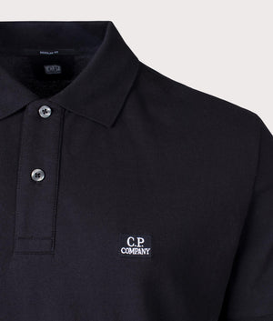 CP Company Stretch Piquet Polo Shirt in Black Detail Shot at EQVVS
