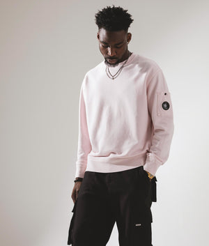 CP Company Cotton Diagonal Fleece Lens Sweatshirt in Heavenly Pink Campaign Shot EQVVS