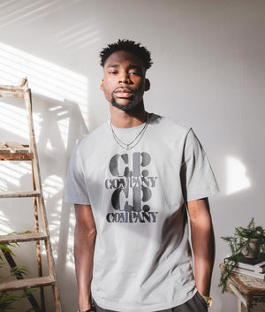 CP Company 30/1 Jersey Graphic T-Shirt in Drizzle Campaign Shot EQVVS