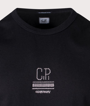 C.P. Company Mercerized Jersey T-Shirt in black. Shot at EQVVS. Detail shot. 
