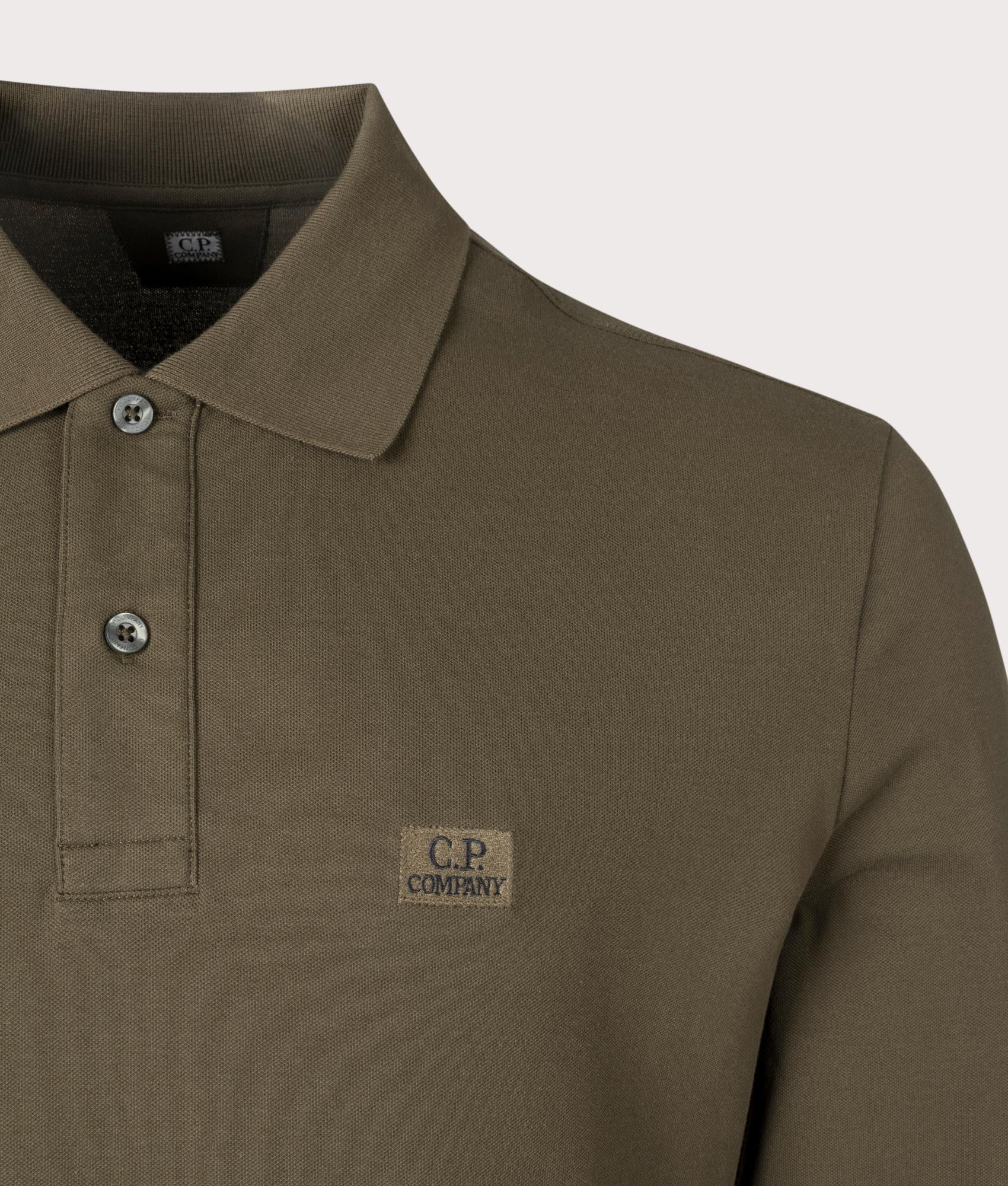 CP Company Stretch Piquet Long Sleeve Polo Shirt In Ivy Green At EQVVS Menswear Detail shot