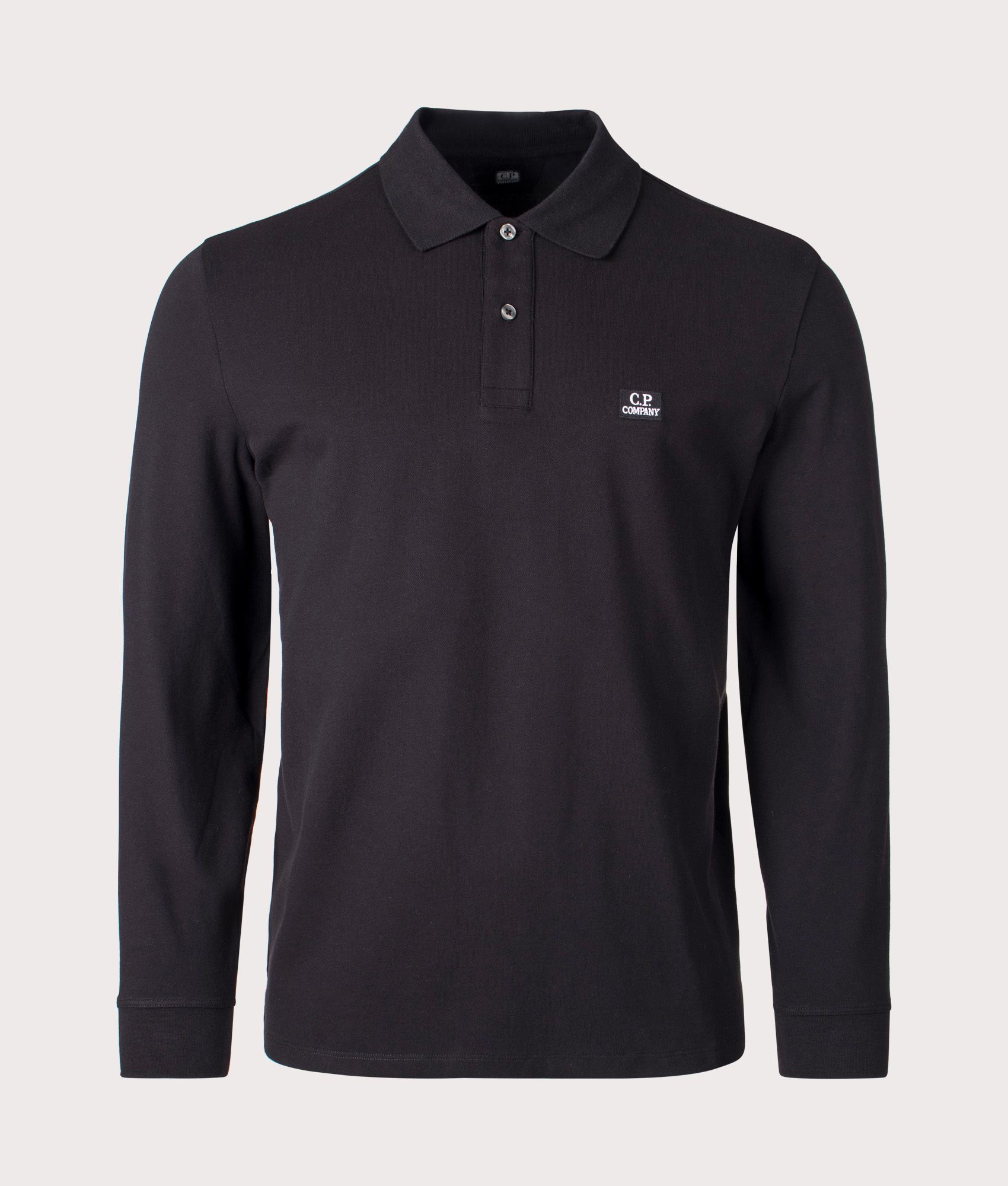 Stretch Piquet Long Sleeve Polo Shirt in Black by C.P. Company. EQVVS Shot.