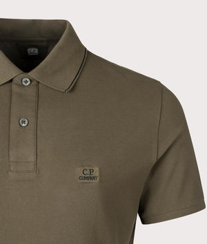 Stretch Piquet Short Sleeve Polo Shirt in Ivy Green by C.P. Company. EQVVS Shot.