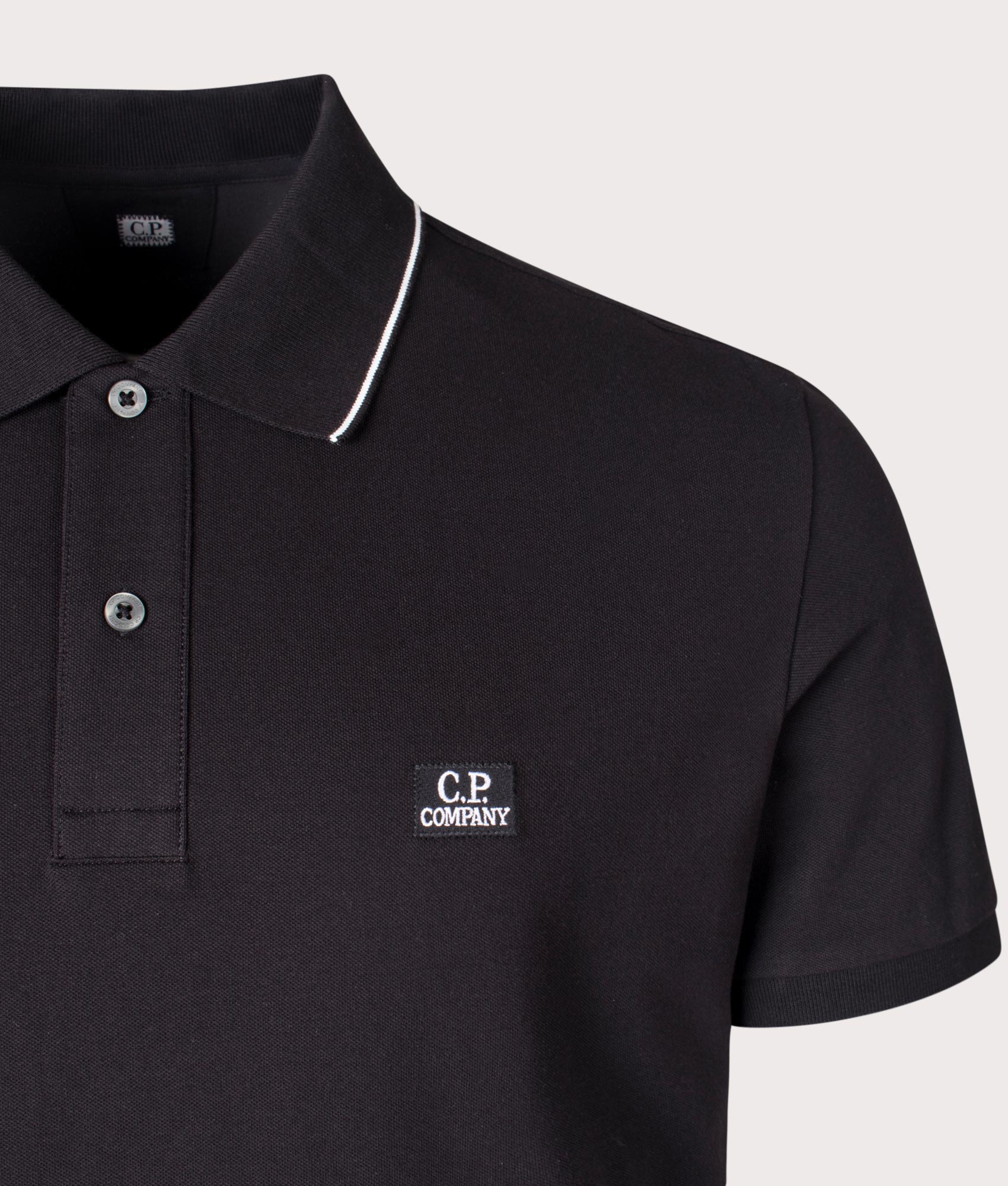 CP Company Stretch Piquet Striped Collar Polo Shirt In Black at EQVVS Menswear detail shot