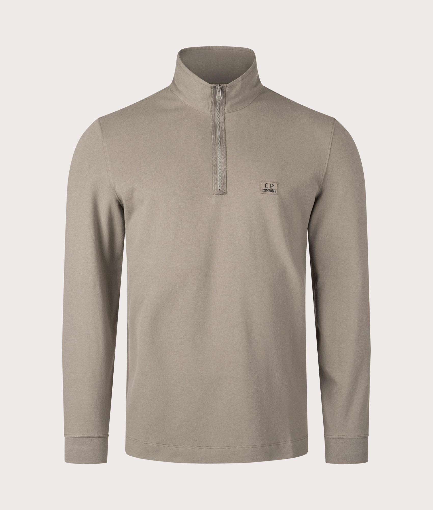 Stretch Piquet Long Sleeve Quarter Zip Polo Shirt in Walnut by C.P. Company. EQVVS Shot. 