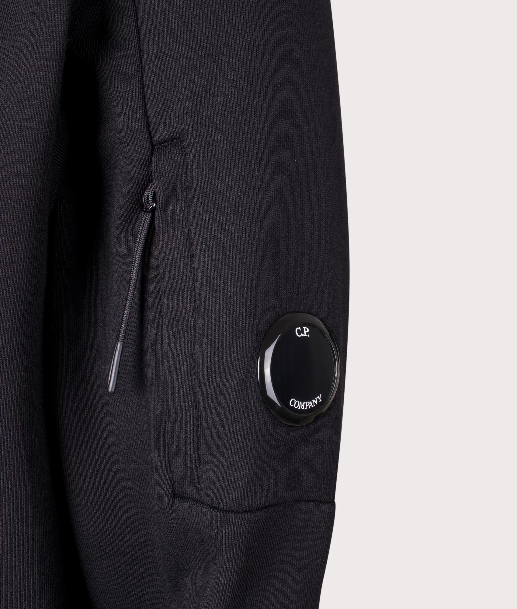 CP Company Diagonal Raised Fleece Lens Sweatshirt In Black at EQVVS Menswear detail shot