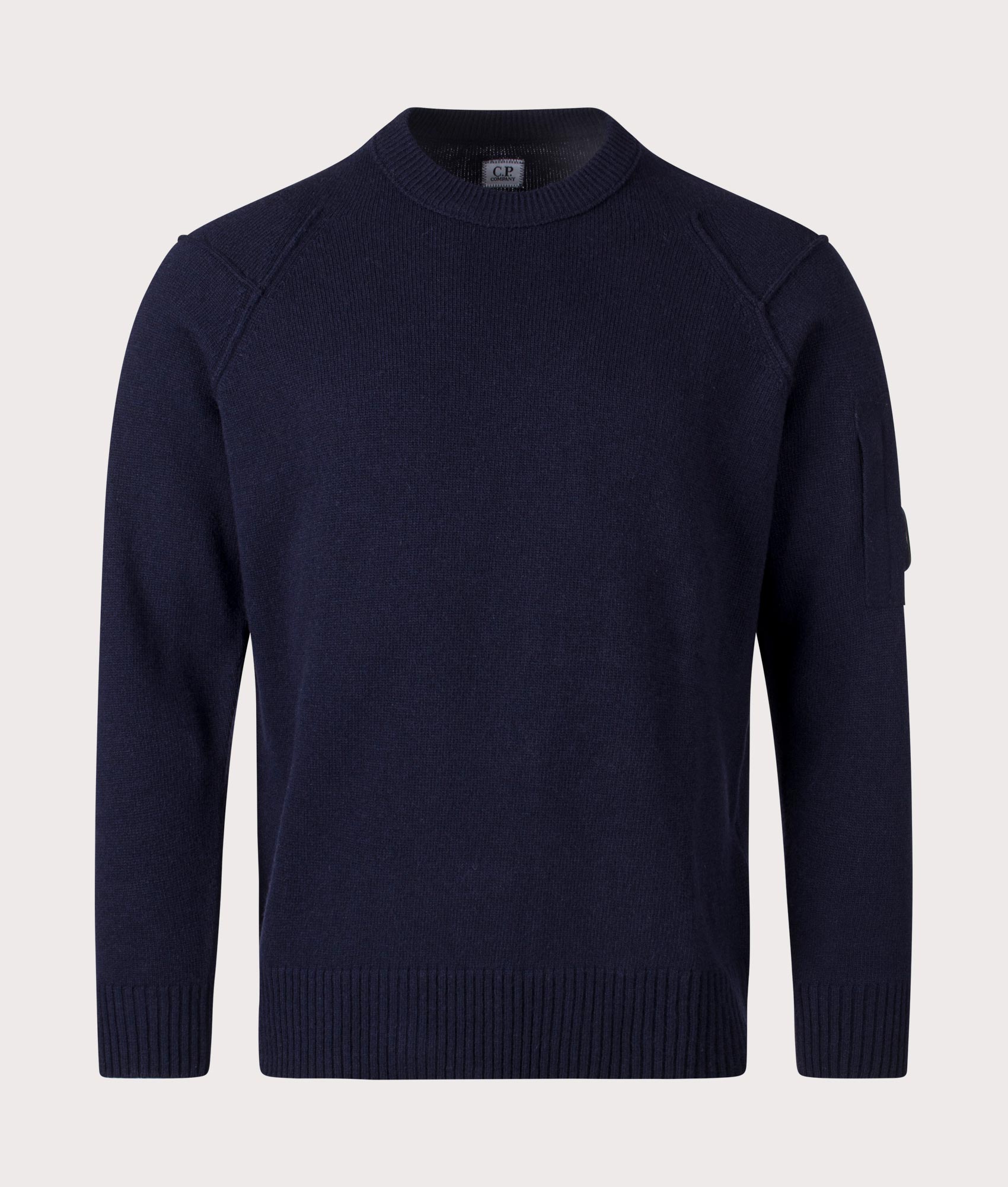 Lambswool Knitted Jumper in Total Eclipse by C.P. Company. shot at EQVVS. Front shot. 
