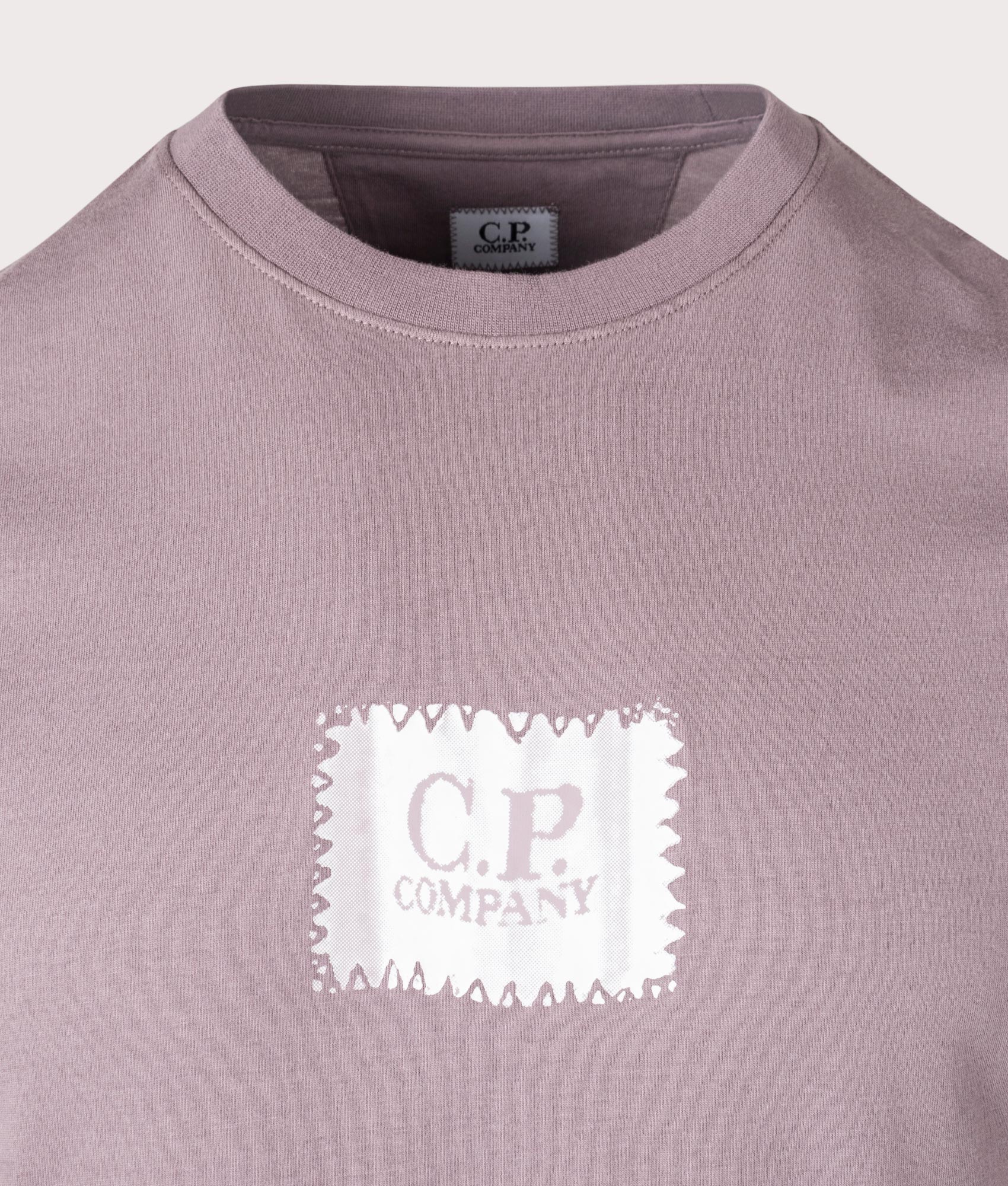 C.P. Company 30/1 Jersey T-Shirt in Purple Dove at EQVVS Menswear. Detail shot.