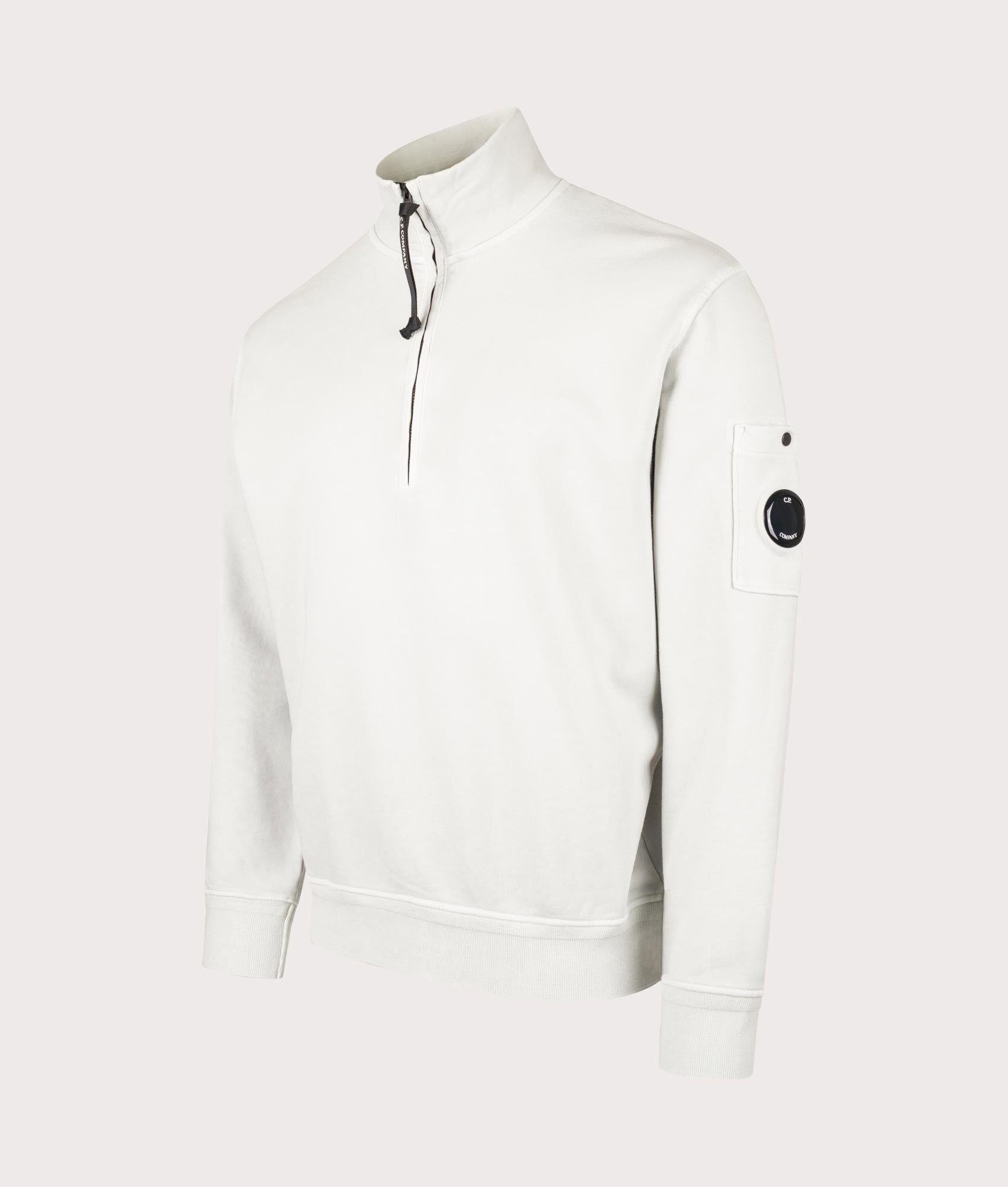 C.P. Company Cotton Diagonal Quarter Zip Sweatshirt in Blue Fox, 100% cotton at EQVVS. Side shot. 