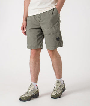 Bermuda Cargo Shorts. Shot by EQVVS. Side angle shot.