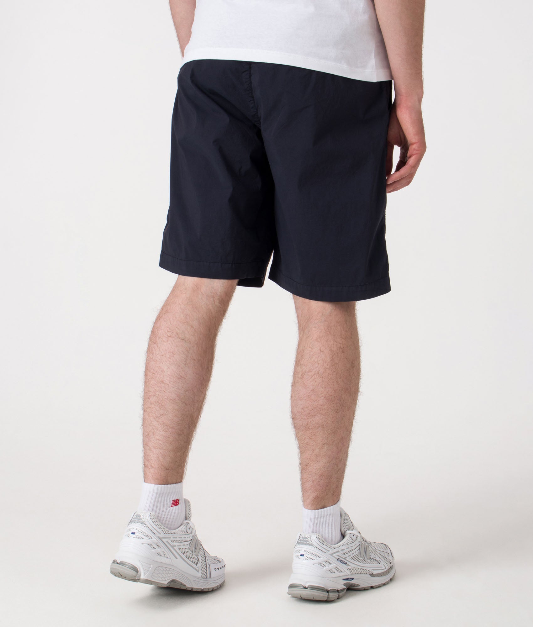 Bermuda Cargo Shorts. Shot by EQVVS. Back model shot.