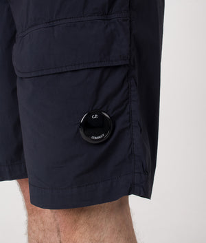 Bermuda Cargo Shorts. Shot by EQVVS. Side detail shot.