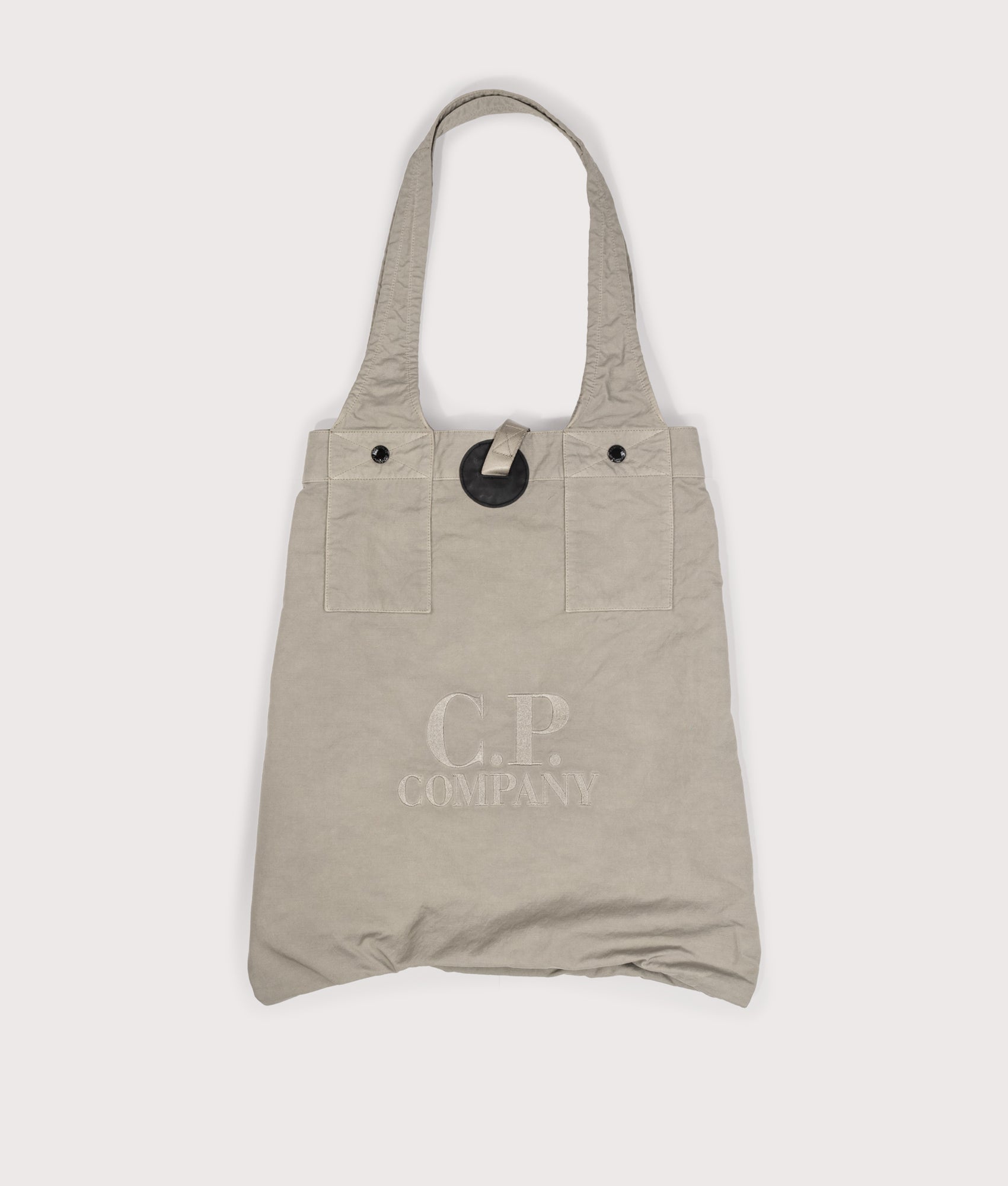 C.P. Company Twill Left Hand Logo Bag in Fallen Rock at EQVVS Menswear. Front shot closed.