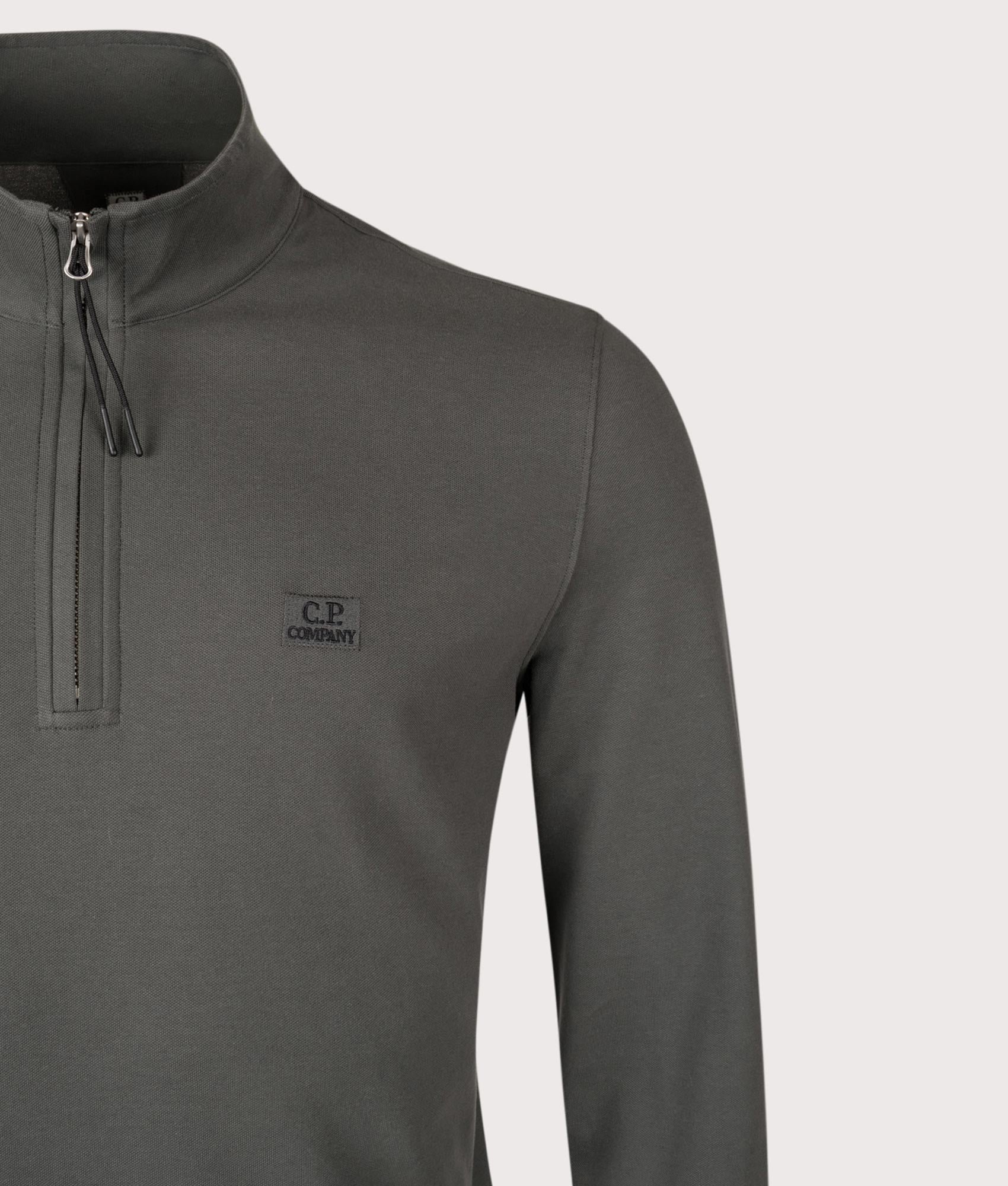 Stretch Piqué Quarter Zip Long Sleeve Polo Shirt. Shot by EQVVS. Detail shot.
