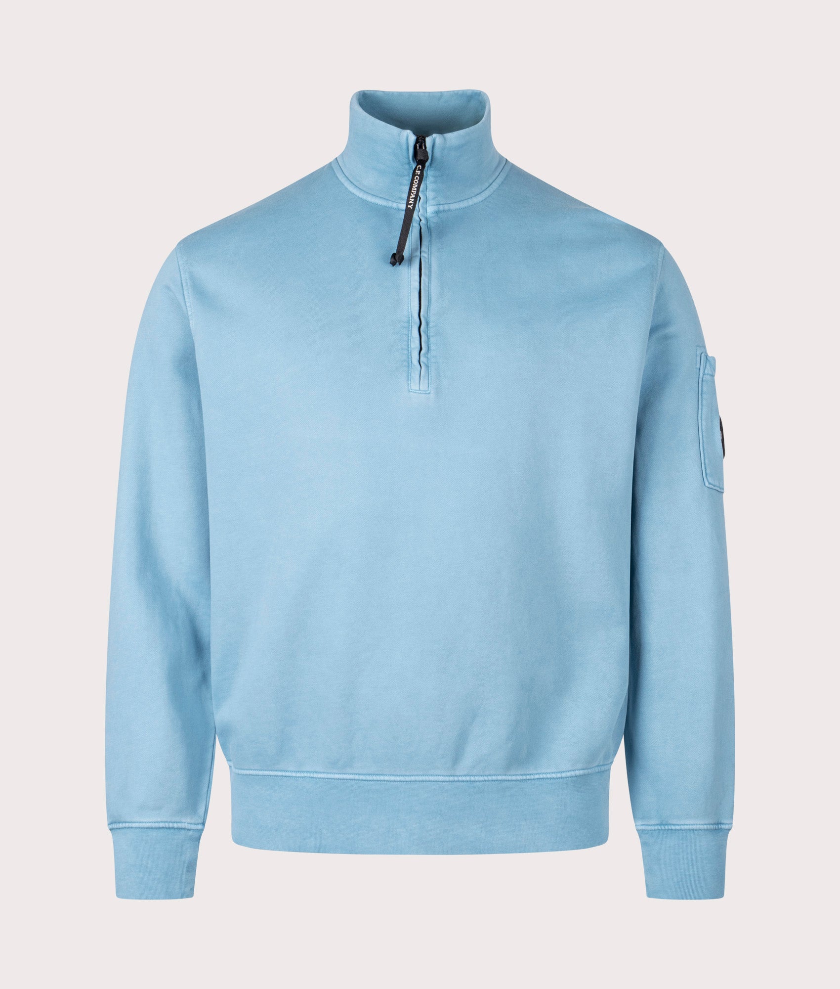 C.P. Company Diagonal Fleece Quarter Zip Sweatshirt in Aegean Blue at EQVVS Menswear. Front shot.