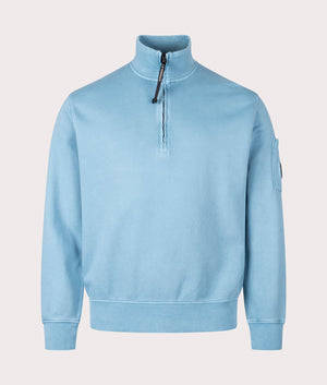 C.P. Company Diagonal Fleece Quarter Zip Sweatshirt in Aegean Blue at EQVVS Menswear. Front shot.