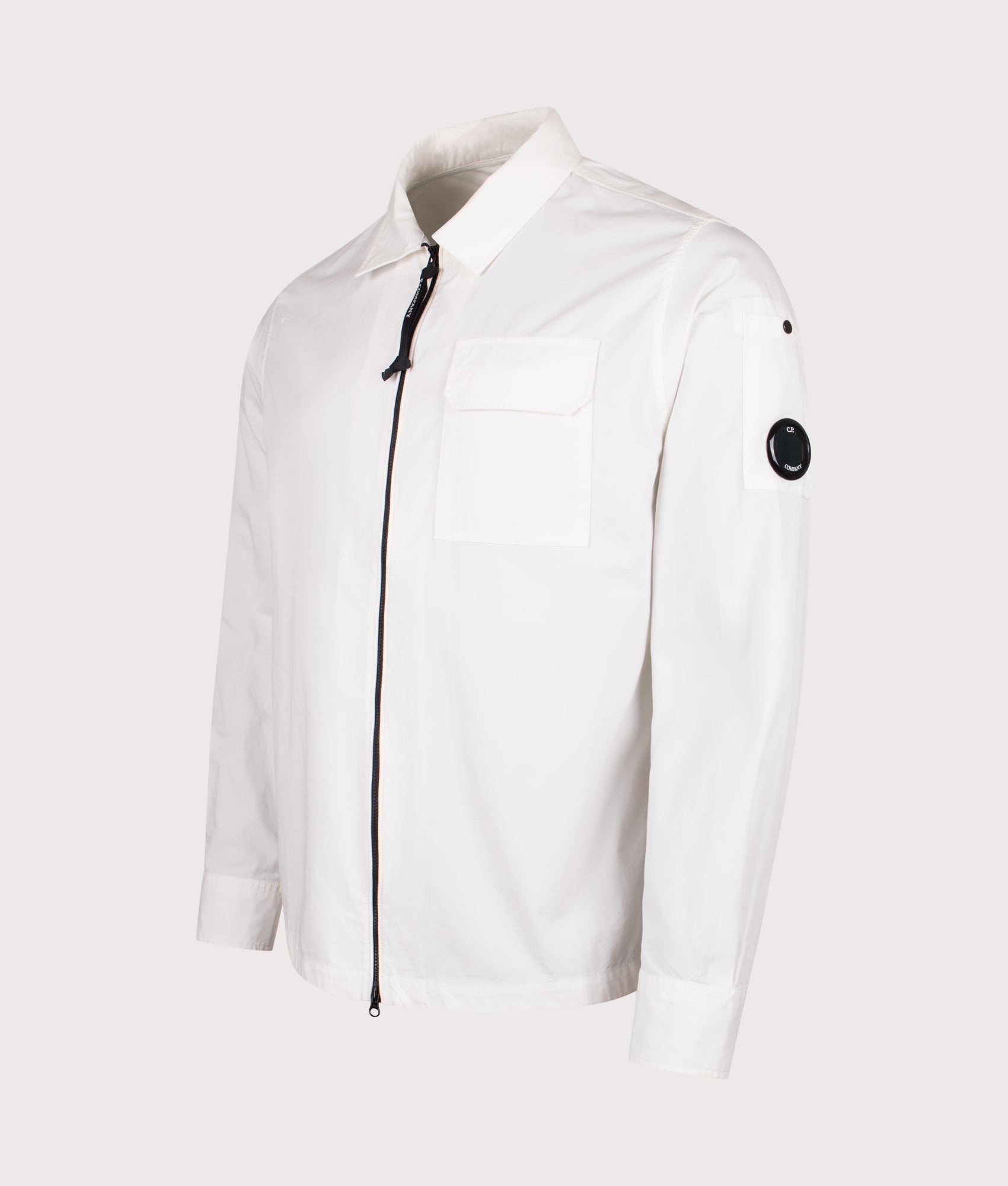 Organic Gabardine Zipped Lens Overshirt in Hauze White | 100% Organic Cotton | C.P. Company | EQVVS | Front angle shot 