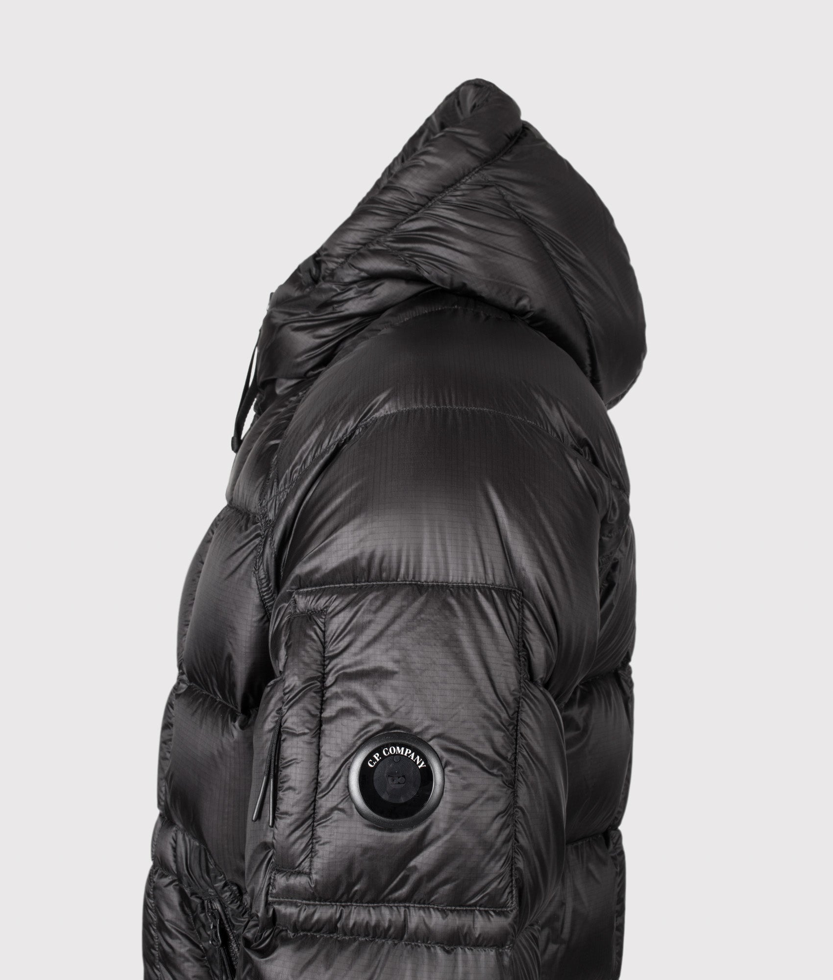C.P. Company D.D. Shell Hooded Down Jacket in Black at EQVVS Menswear.  Detail shot.