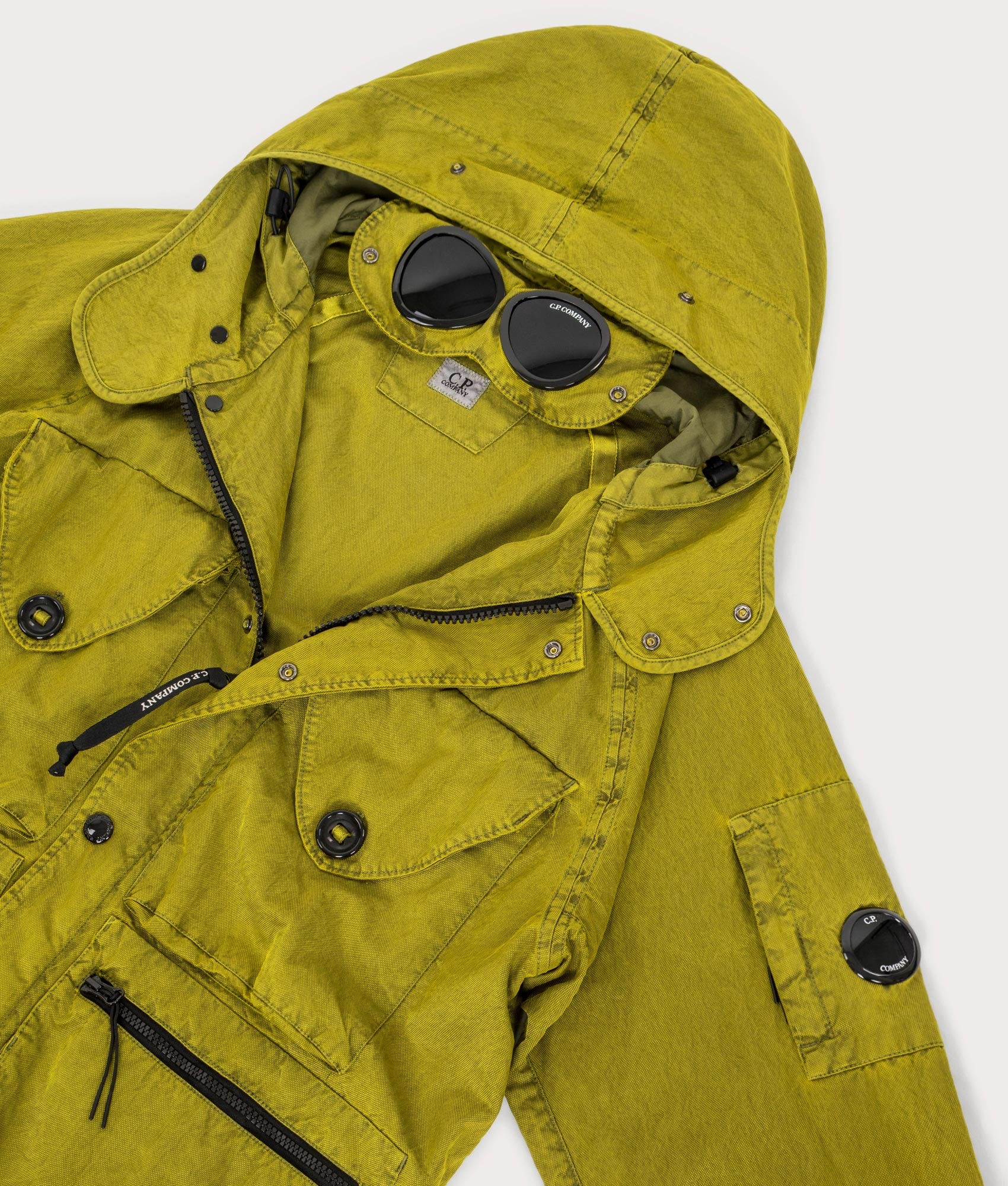 Panama-R Mixed Goggle Jacket in Antique Moss | 100% Polyamide | C.P. Company | EQVVS | Open detail shot 