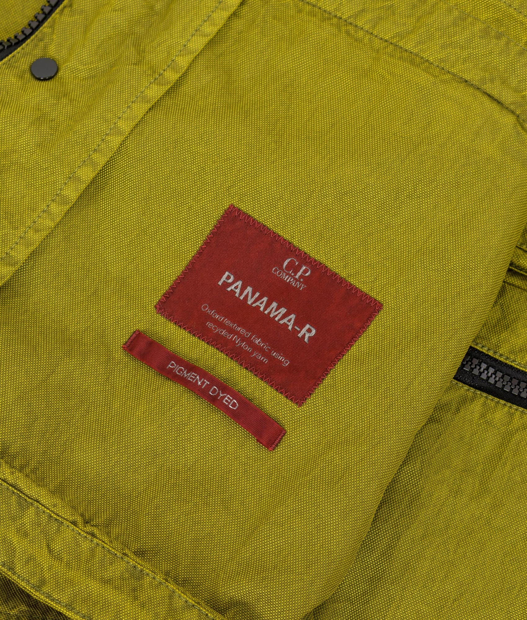 Panama-R Mixed Goggle Jacket in Antique Moss | 100% Polyamide | C.P. Company | EQVVS | Label shot 