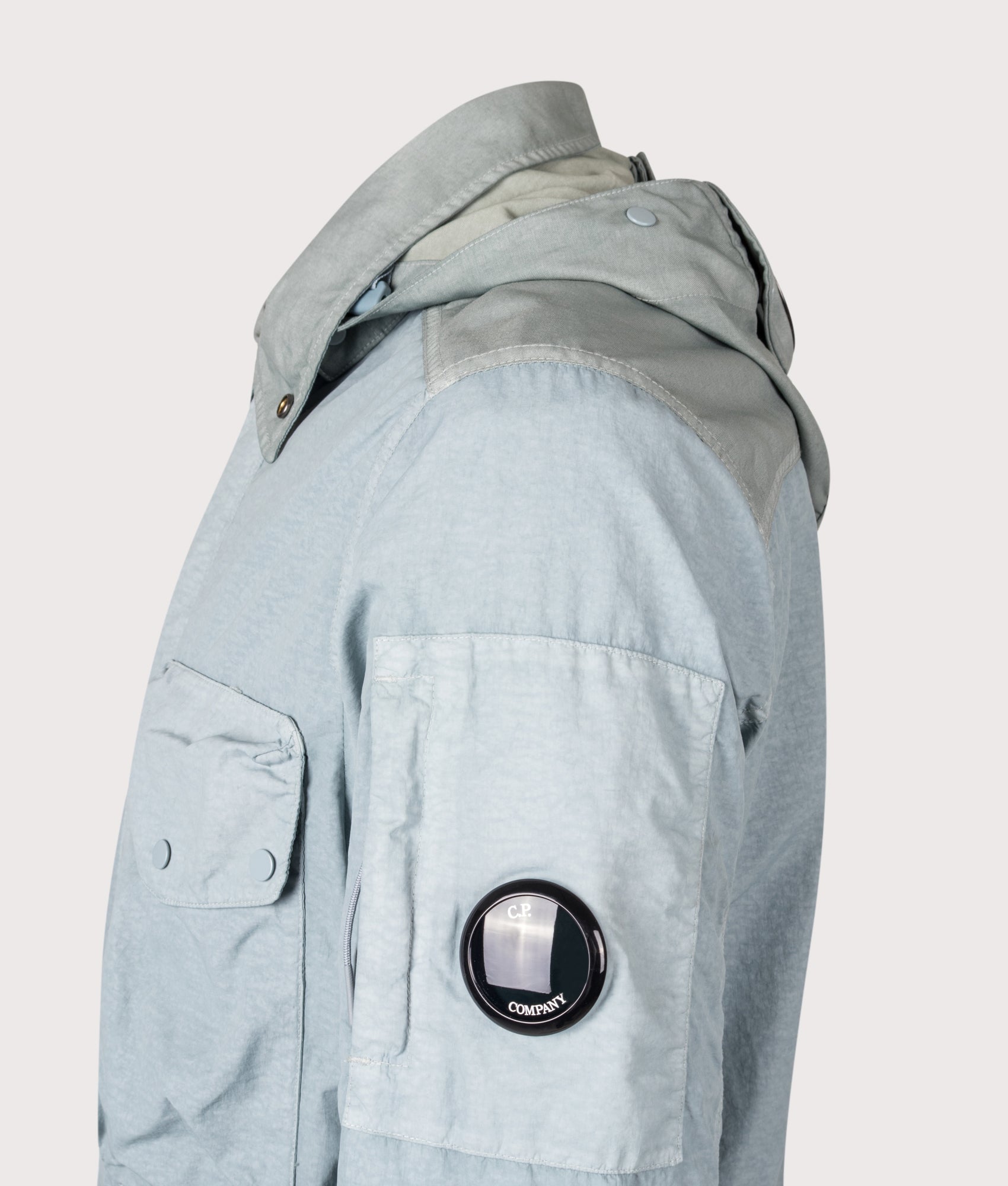 C.P. Company Flatt Nylon Mixed Goggle Overshirt in Silver blue at EQVVS Menswear. Detail shot.