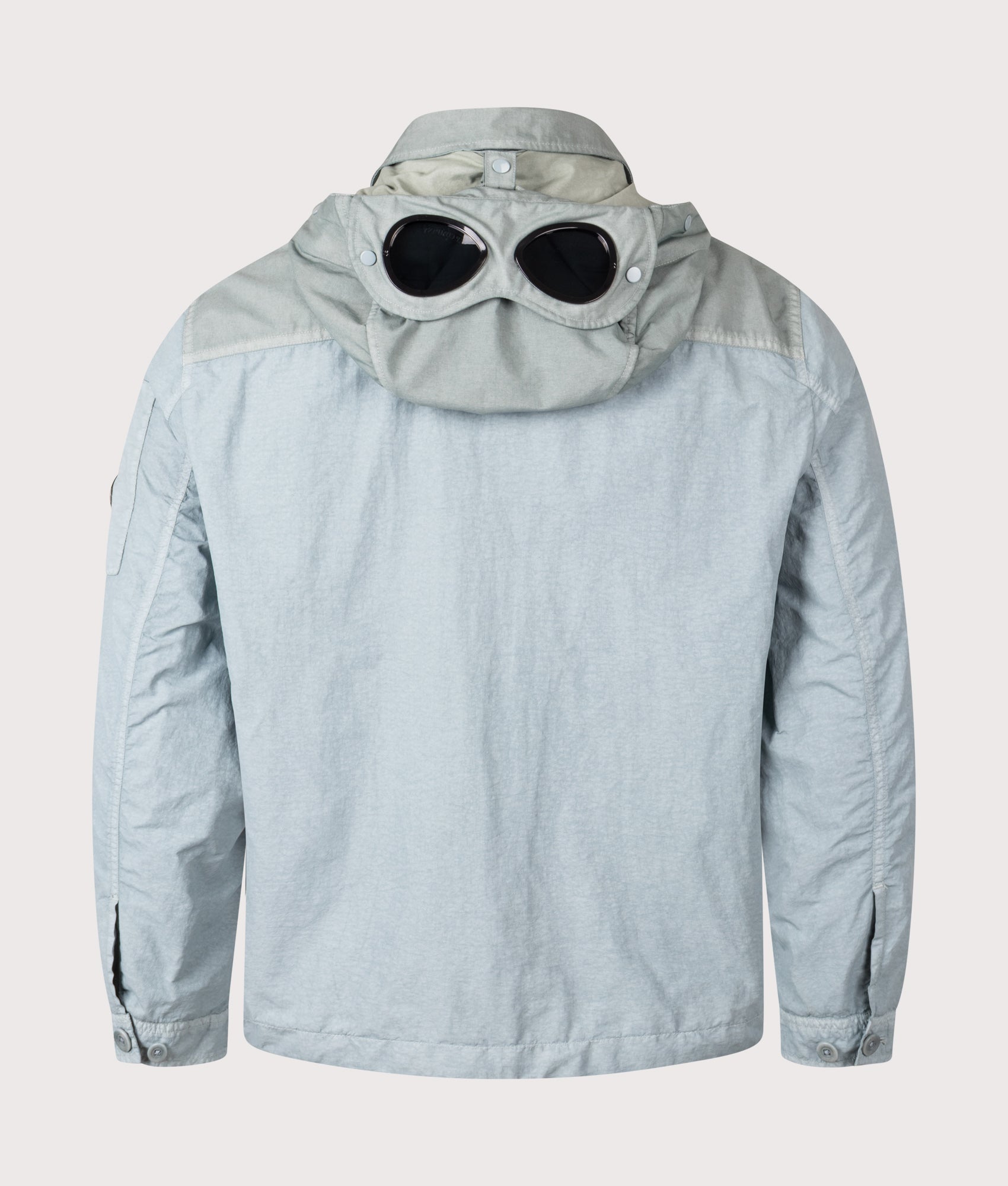 C.P. Company Flatt Nylon Mixed Goggle Overshirt in Silver blue at EQVVS Menswear. Back shot.
