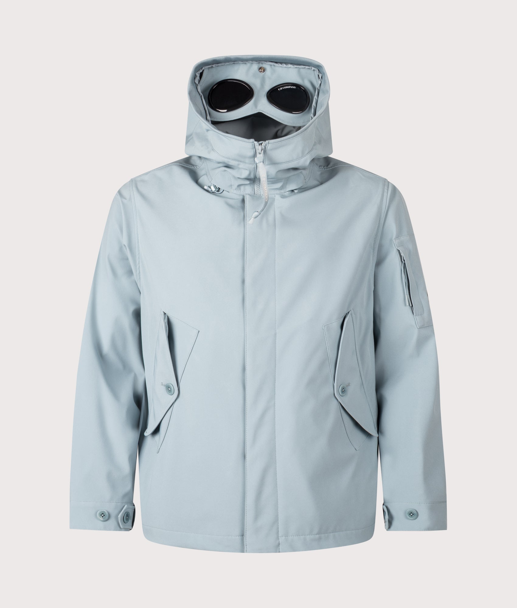 C.P. Company Shell-R Goggle Jacket in Silver Blue at EQVVS Menswear. Front shot.