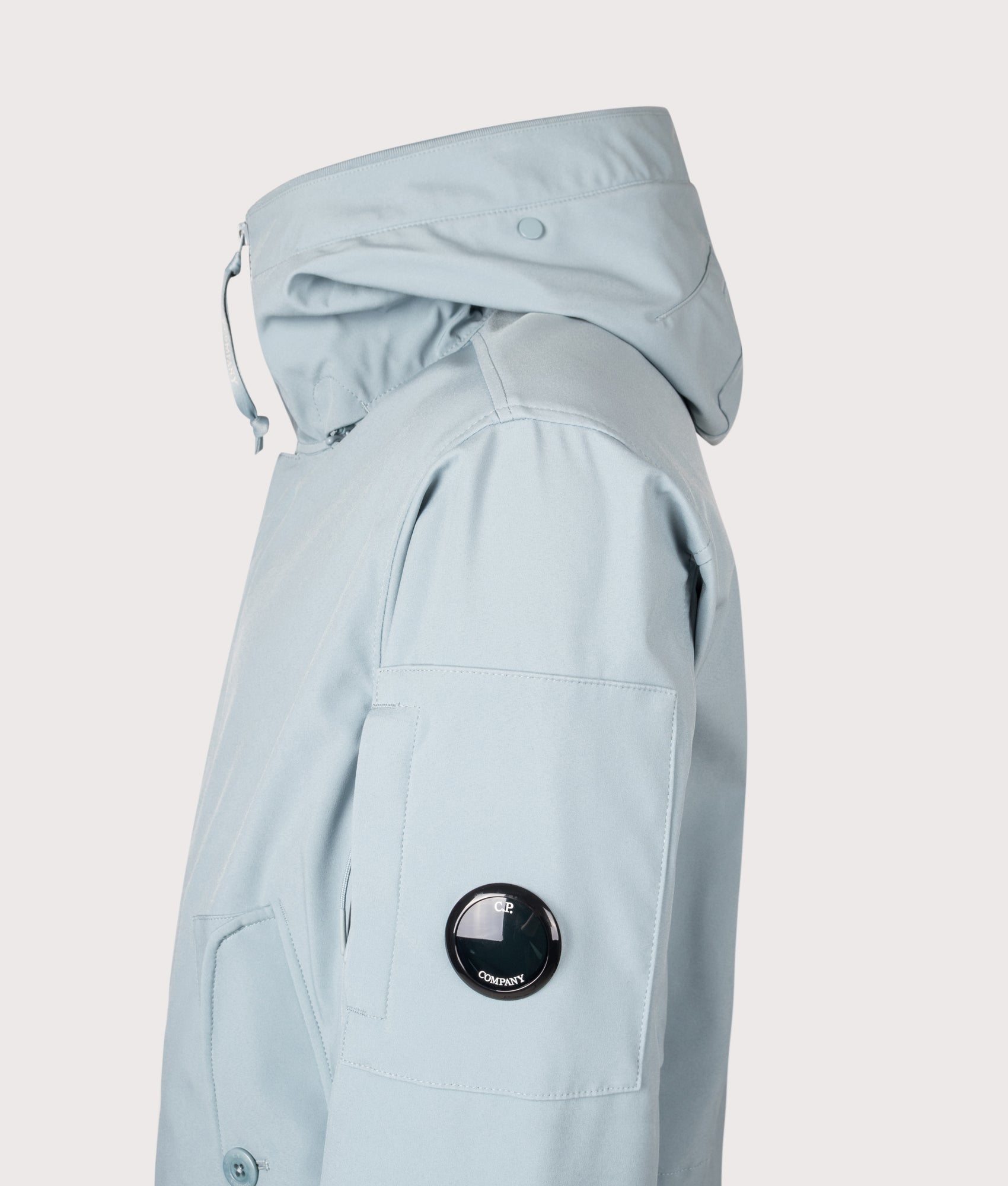 C.P. Company Shell-R Goggle Jacket in Silver Blue at EQVVS Menswear. Side detail shot. 