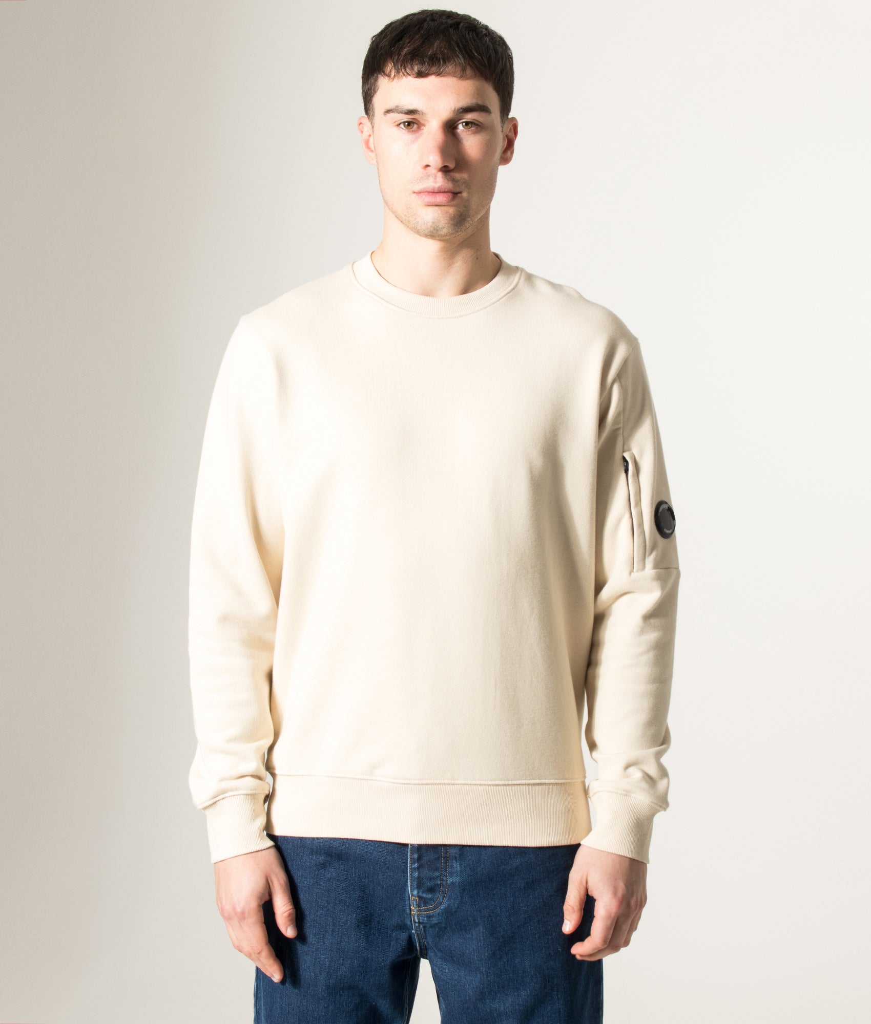 C.P. Company Diagonal Raised Fleece Lens Sweatshirt in Frozen Dew at EQVVS Menswear. Model front shot.