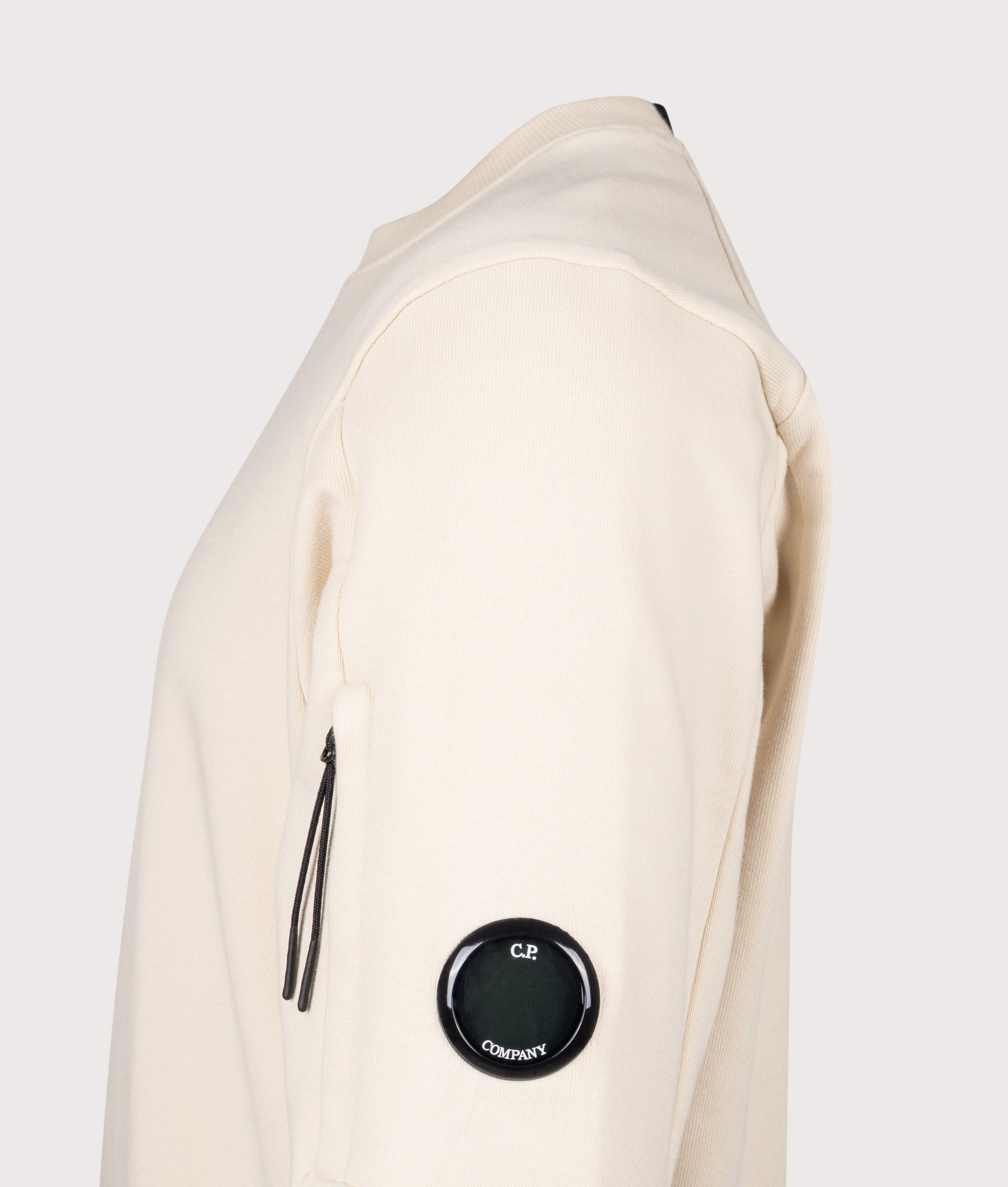 C.P. Company Diagonal Raised Fleece Lens Sweatshirt in Frozen Dew at EQVVS Menswear. Detail shot.