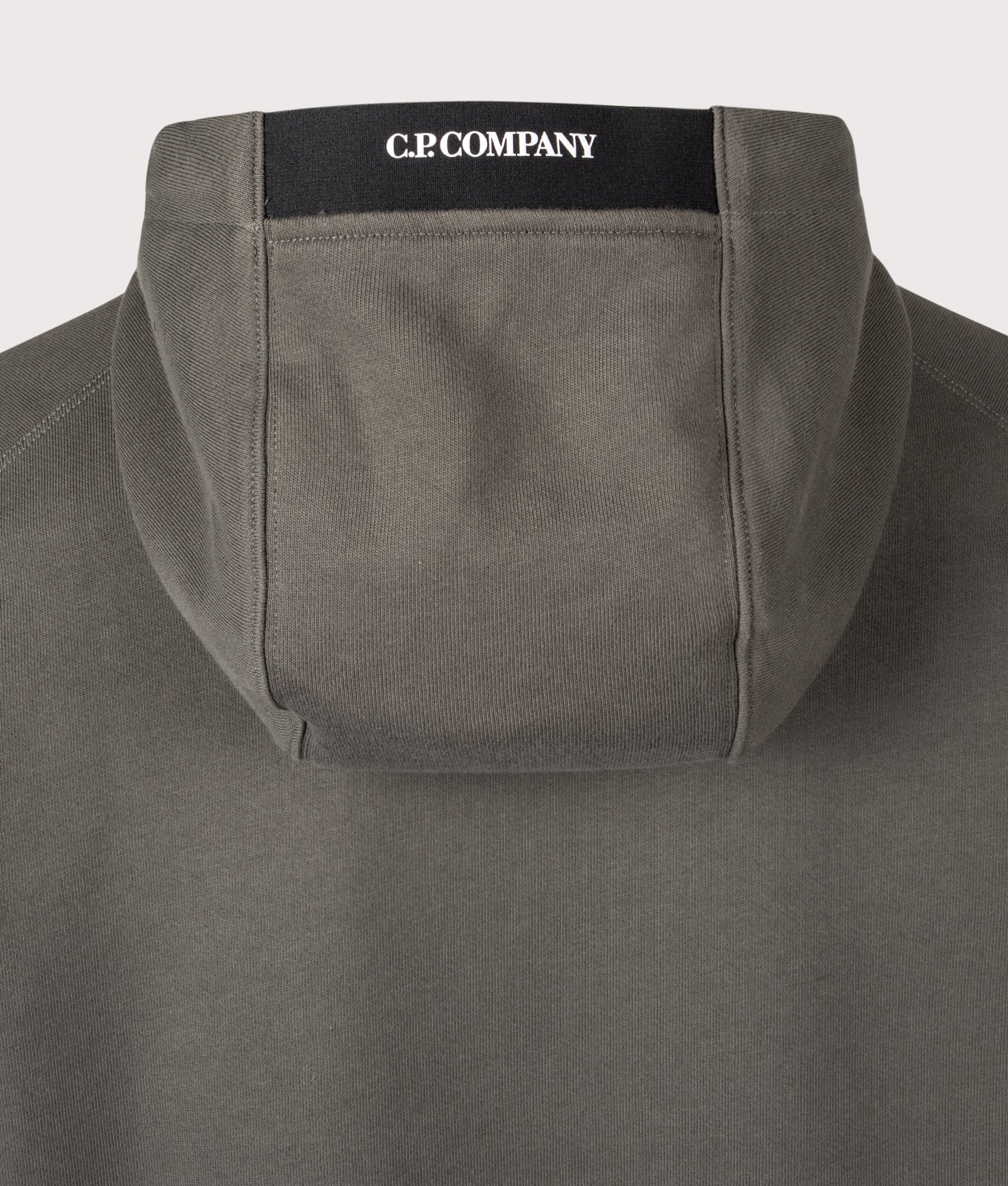 C.P. Company Diagonal Raised Fleece Lens Hoodie in Gunmetal at EQVVS Menswear. Second detail shot.