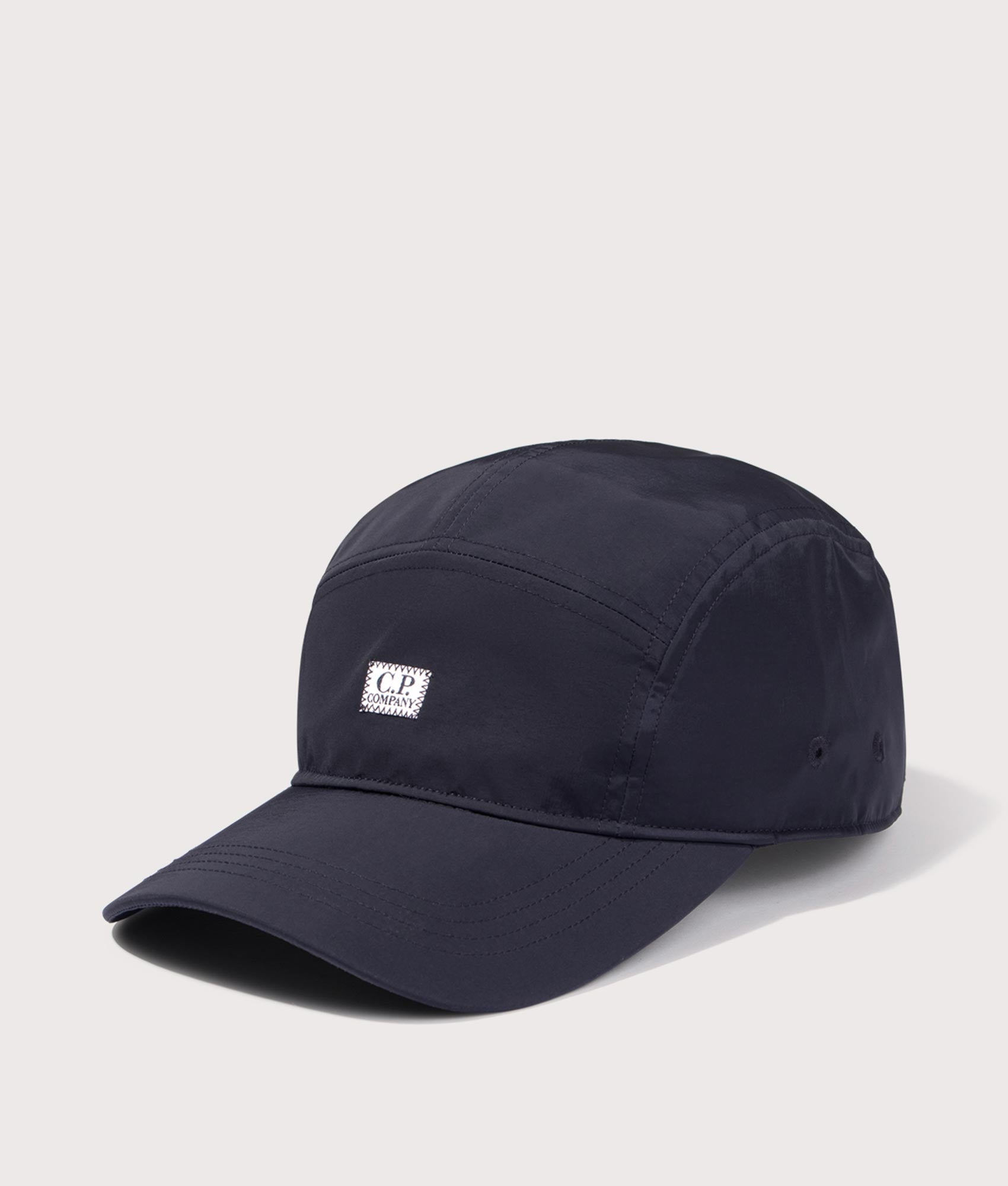 C.P. Company Chrome-R Cap in Total Eclipse at EQVVS Menswear. Angled front shot. 