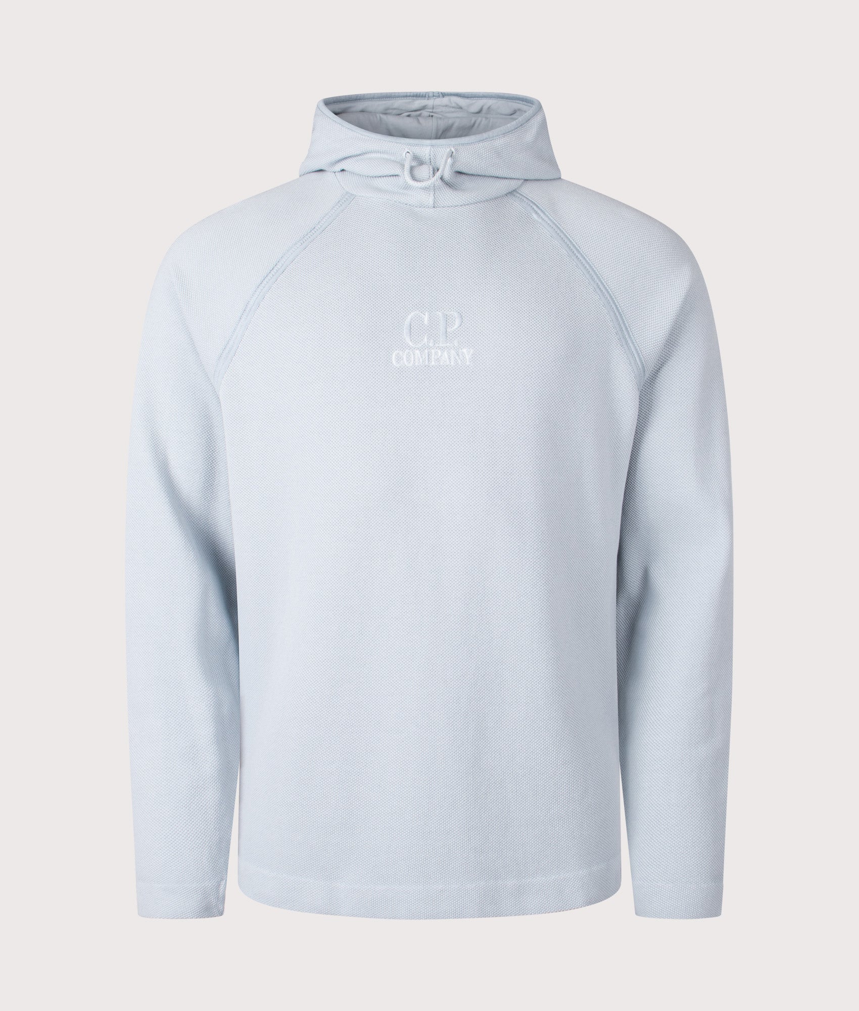 C.P. Company Heavy Piquet Pigment Dyed Hoodie in Silver Blue at EQVVS Menswear. Front shot.