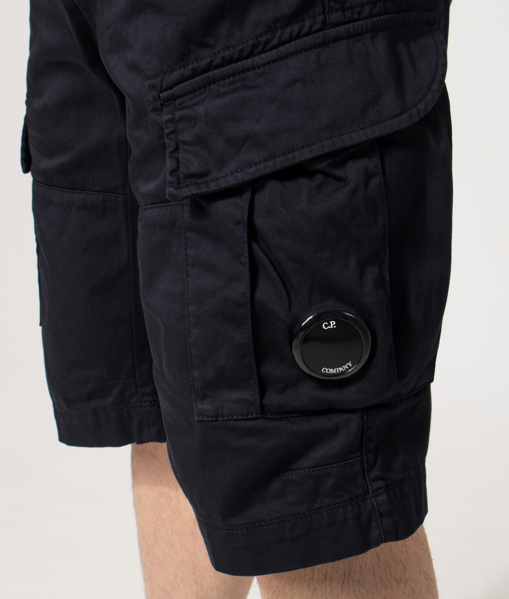Regular Fit Stretch Sateen Cargo Lens Shorts in Total Eclipse | C.P. Company | EQVVS | Side detail model shot 