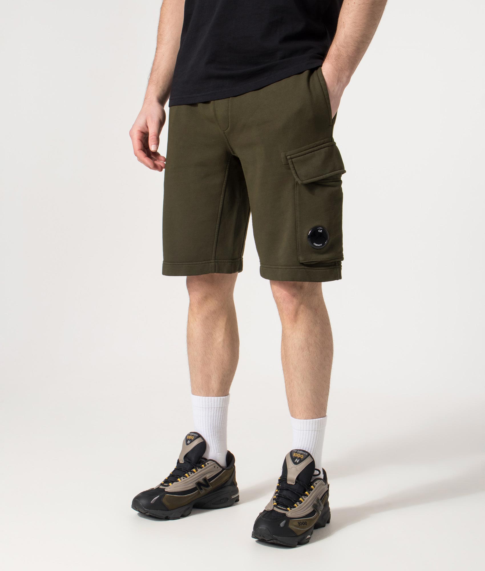 Diagonal Fleece Cargo Sweatshorts in Ivy Green | C.P. Company | EQVVS | Front angle model shot 