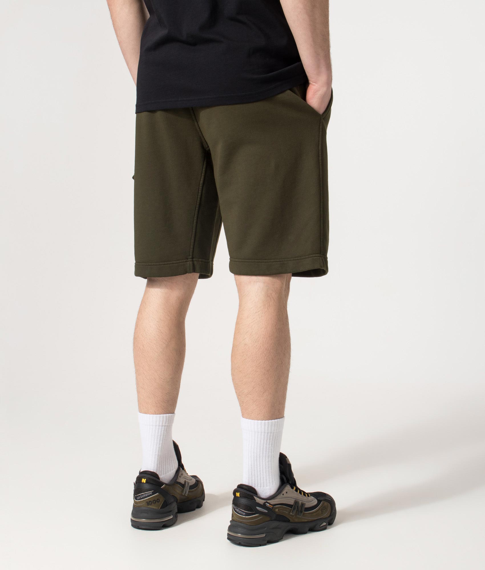 Diagonal Fleece Cargo Sweatshorts in Ivy Green | C.P. Company | EQVVS | Back model shot 