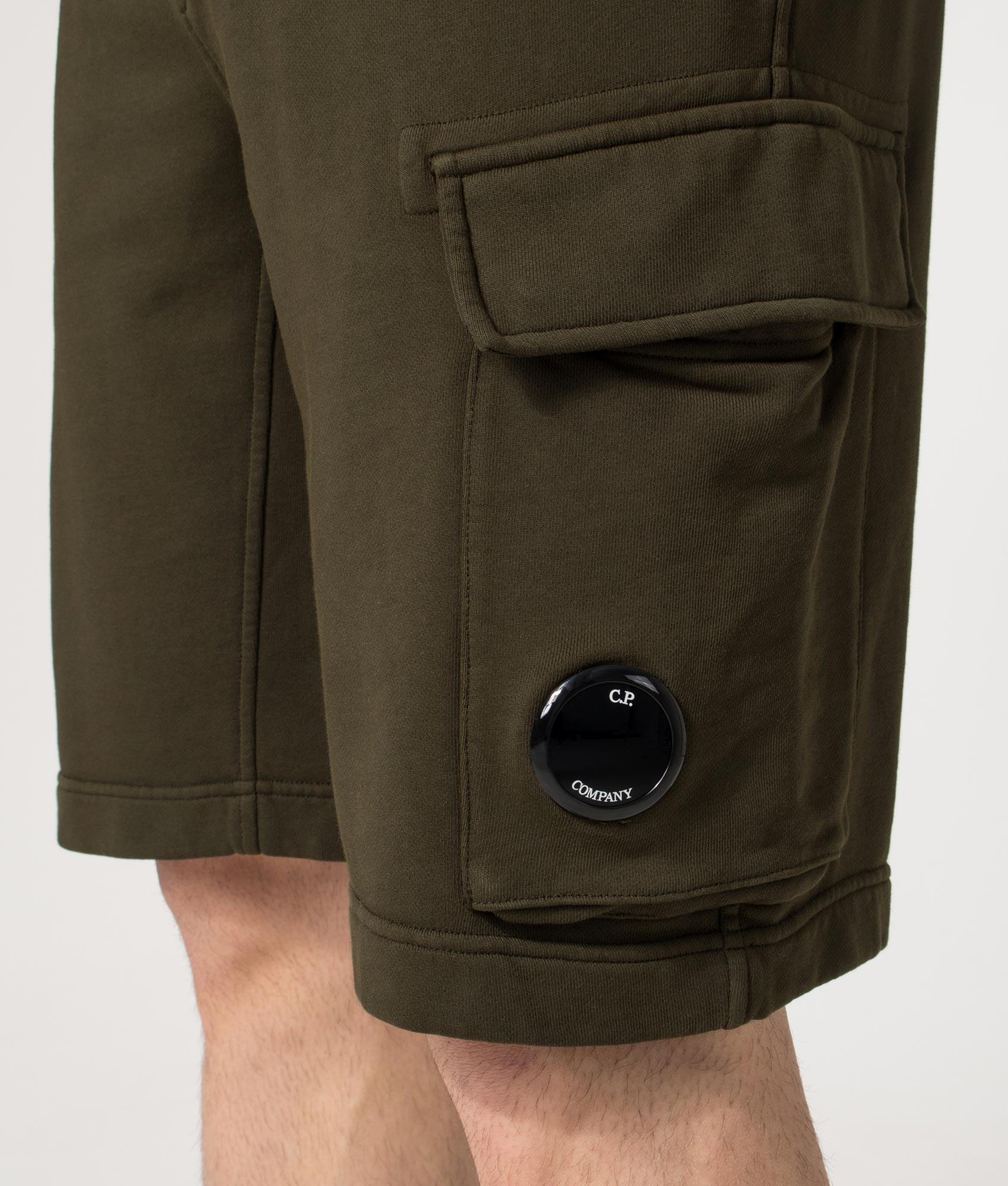 Diagonal Fleece Cargo Sweatshorts in Ivy Green | C.P. Company | EQVVS | Detail model shot 
