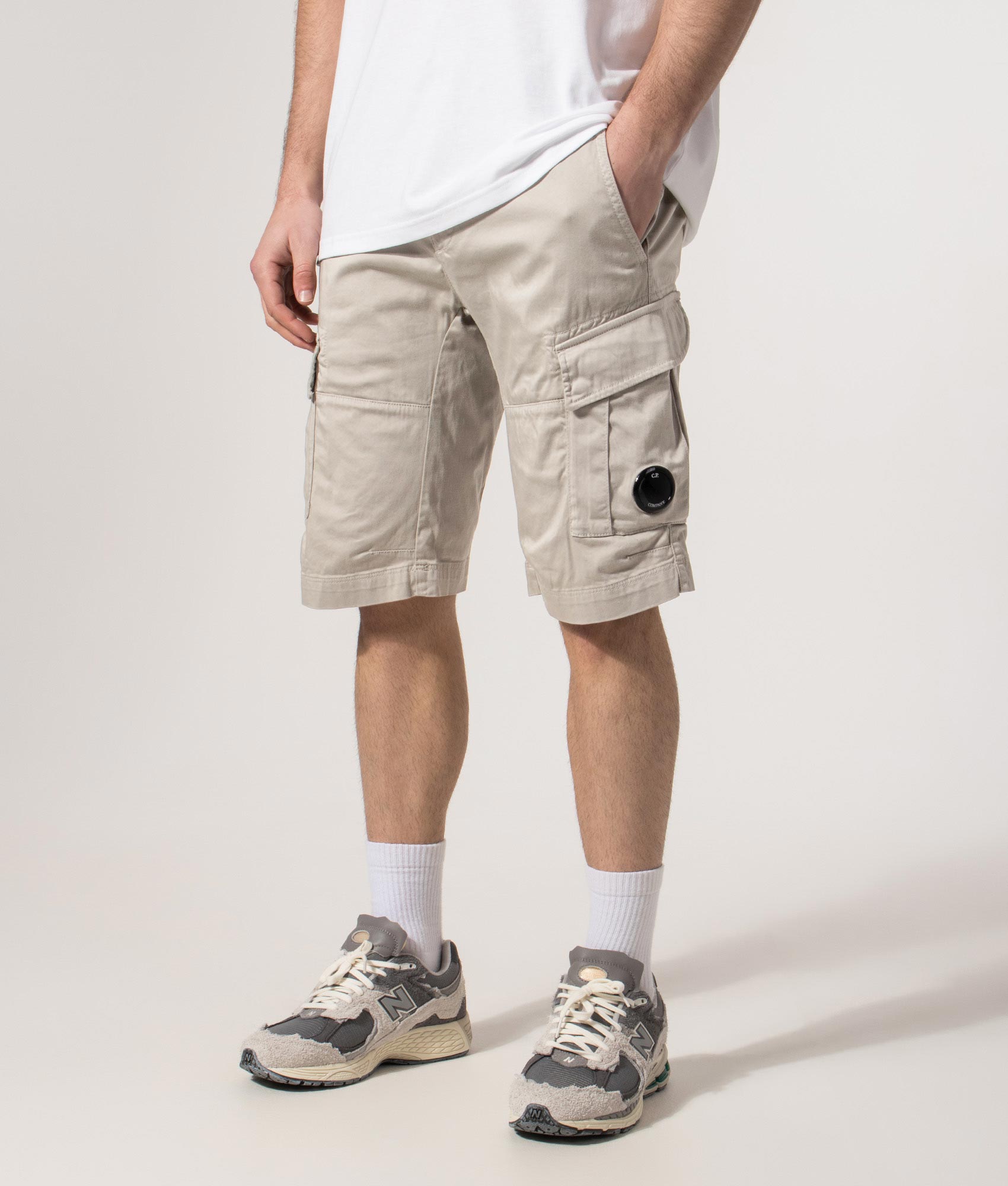 Stretch Sateen Cargo Lens Shorts in Dove | C.P. Company | EQVVS | Front angle model shot 