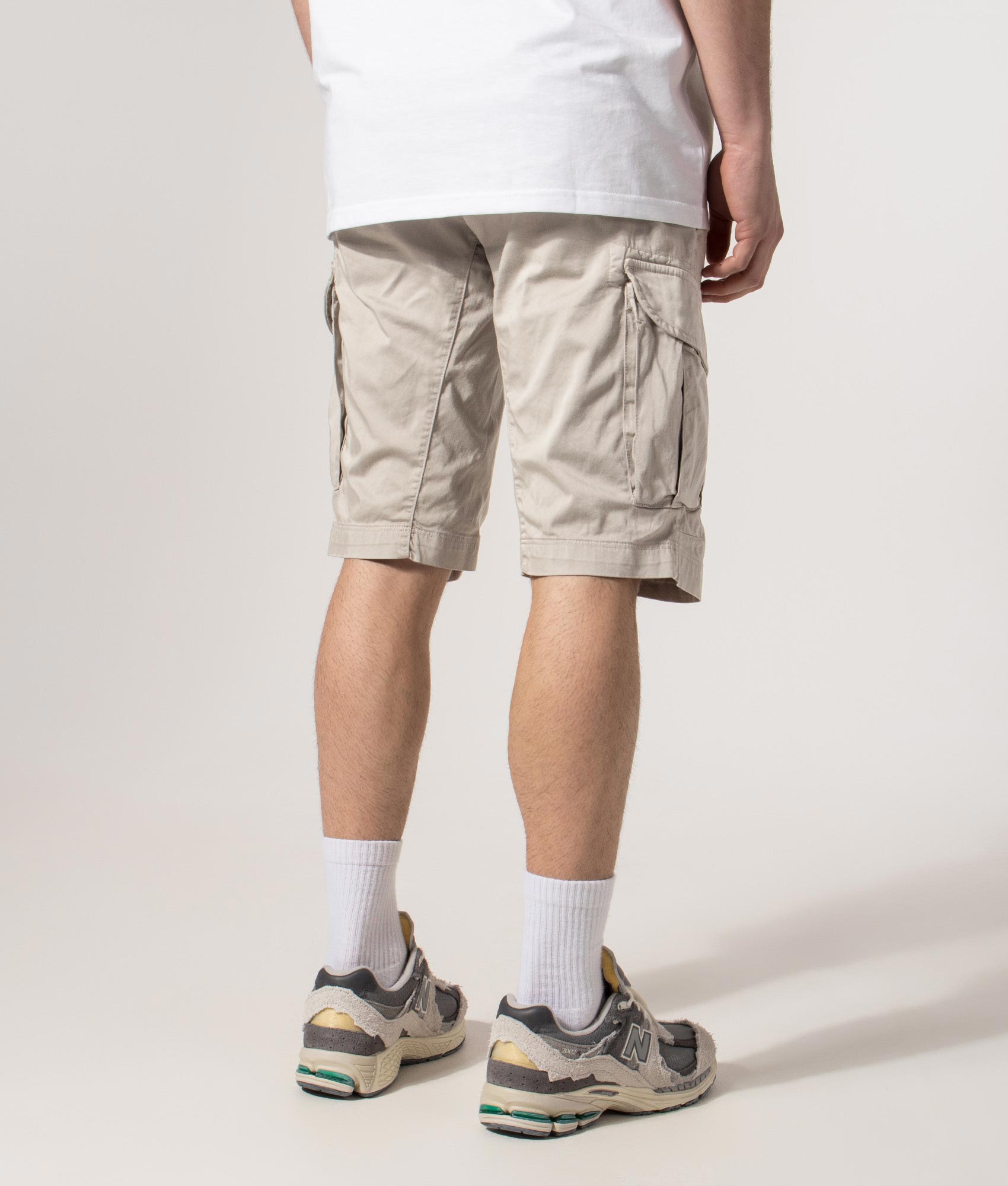 Stretch Sateen Cargo Lens Shorts in Dove | C.P. Company | EQVVS | Back angle model shot 