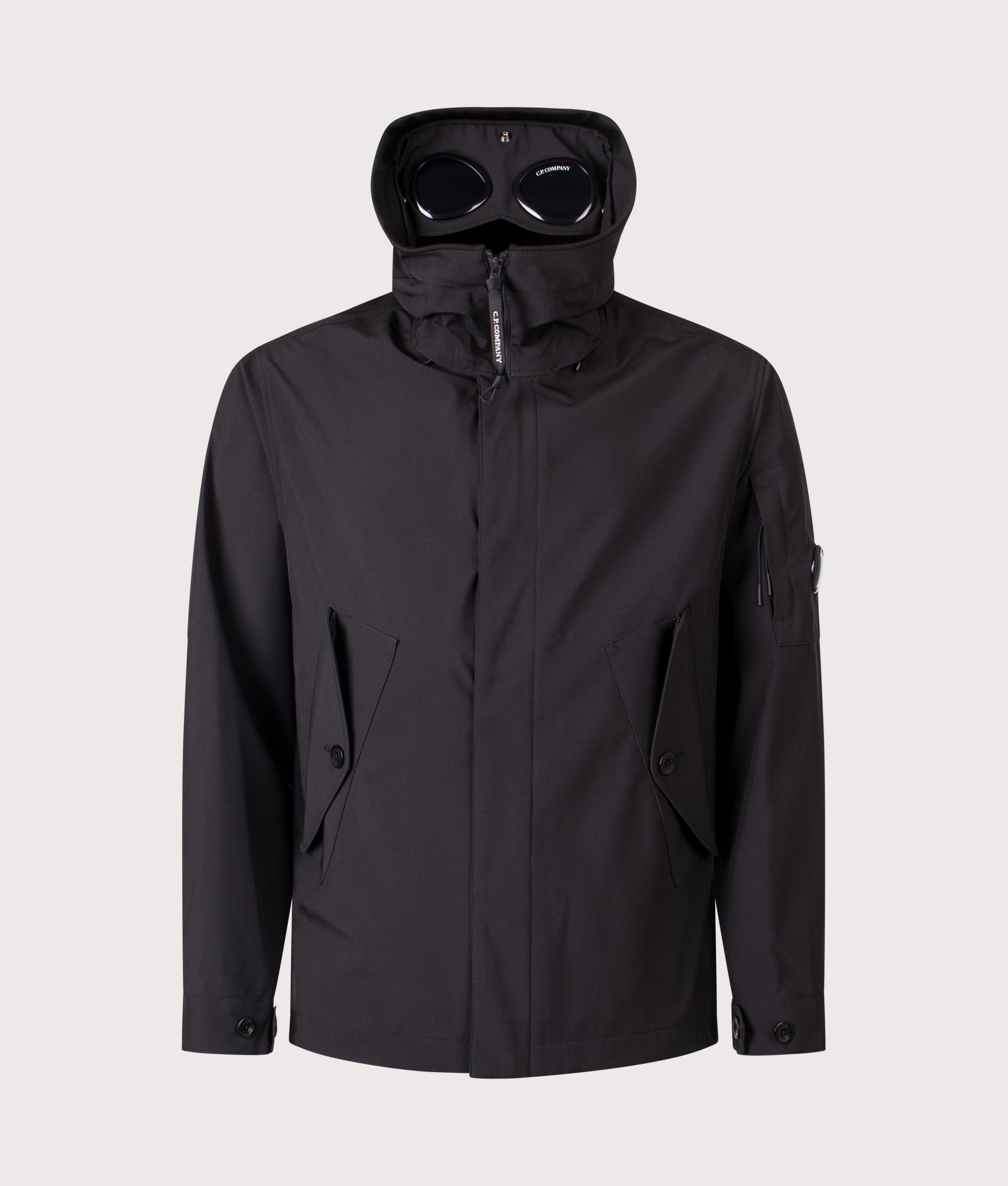 C.P. Company Shell-R Goggle Jacket in Black at EQVVS Menswear. Front shot.